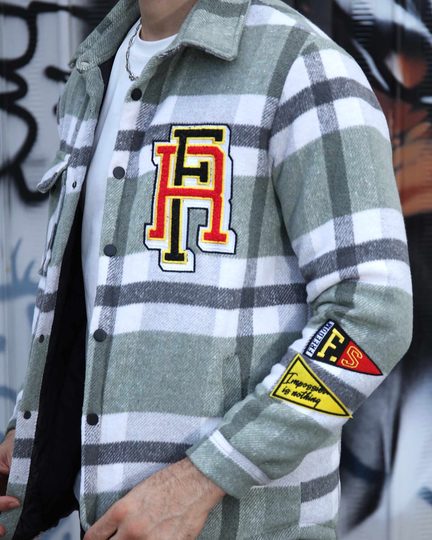 Logeqi modern plaid moto jacket in green and white with patch details on chest and sleeve
