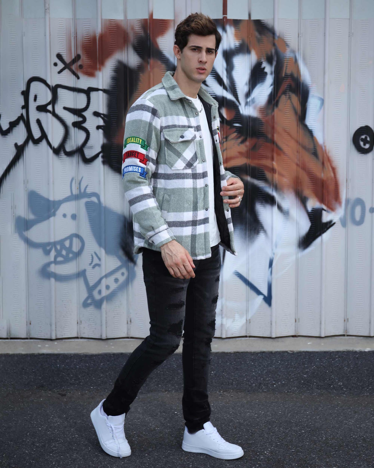 Logeqi modern plaid moto jacket worn by male model with black jeans and white sneakers