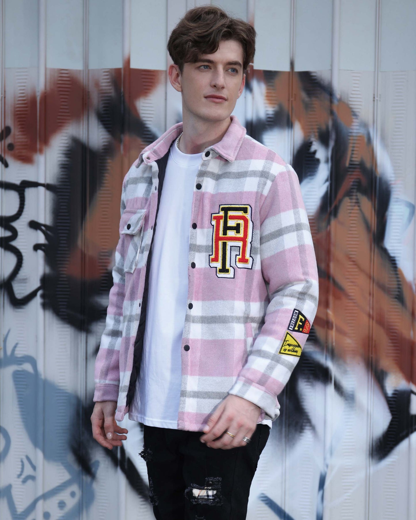 Logeqi modern plaid moto jacket in pink gray and white worn by young male model with patches