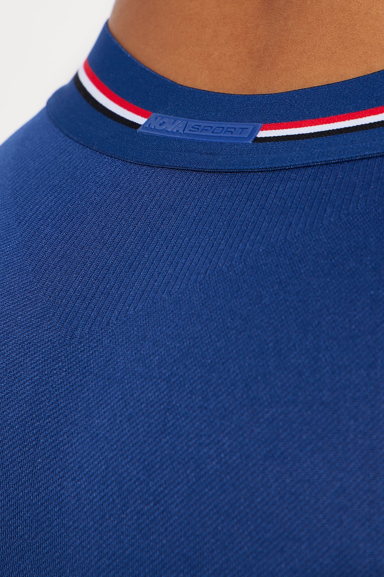 Close-up of Nova Sport seamless active hot shorts in blue with a stylish ribbed waistband