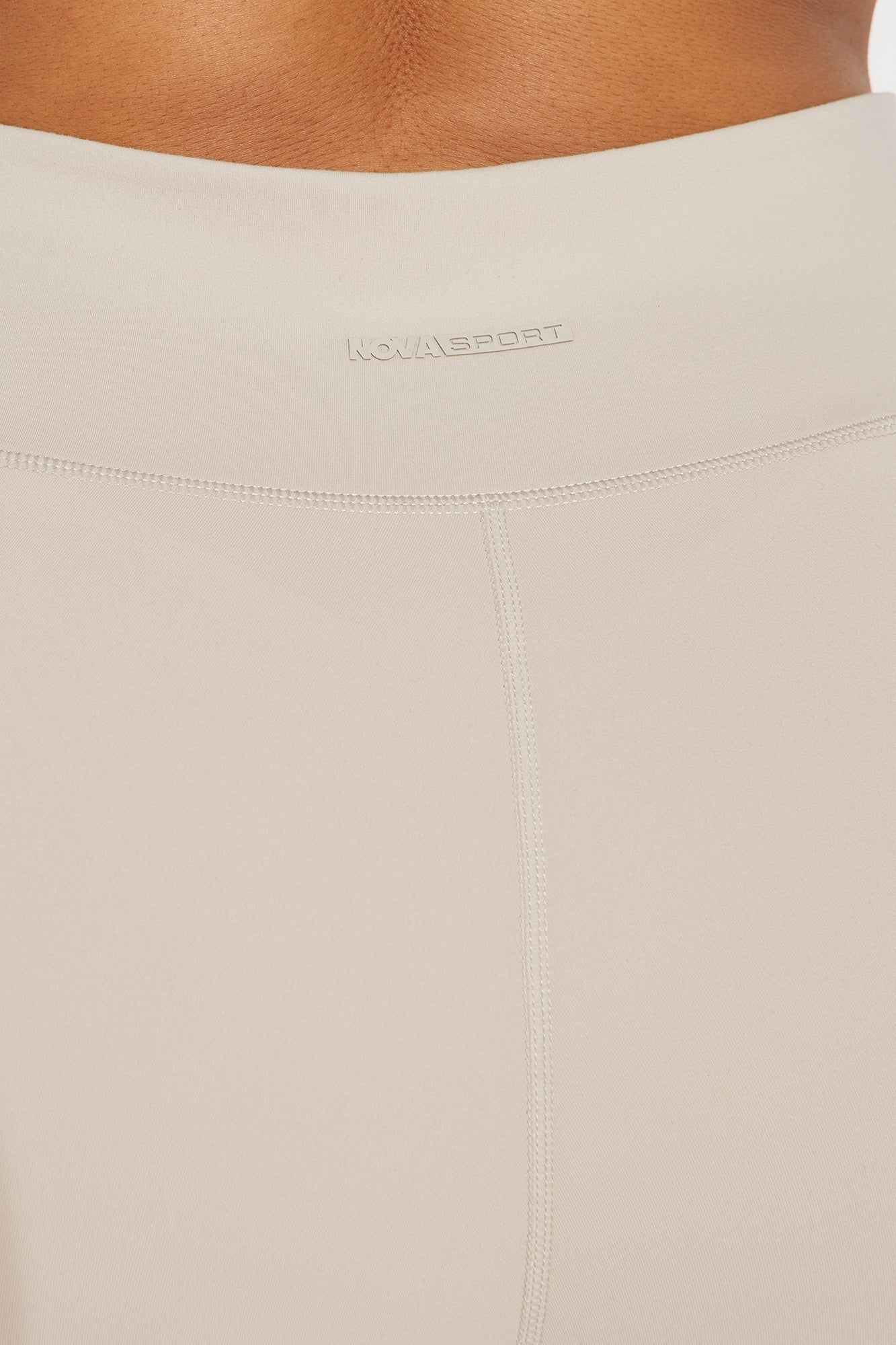 Close-up of Nova Sport super soft active capri waistband in neutral color for ultimate comfort