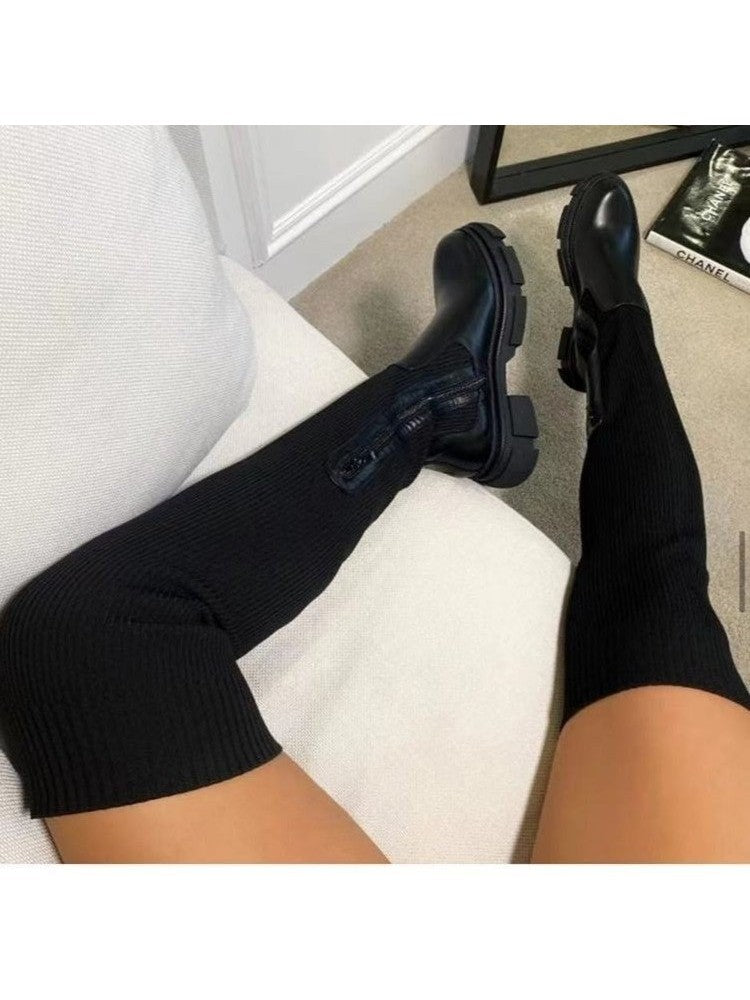 Wholesale7 black patchwork over the knee boots with chunky soles and side zipper detail