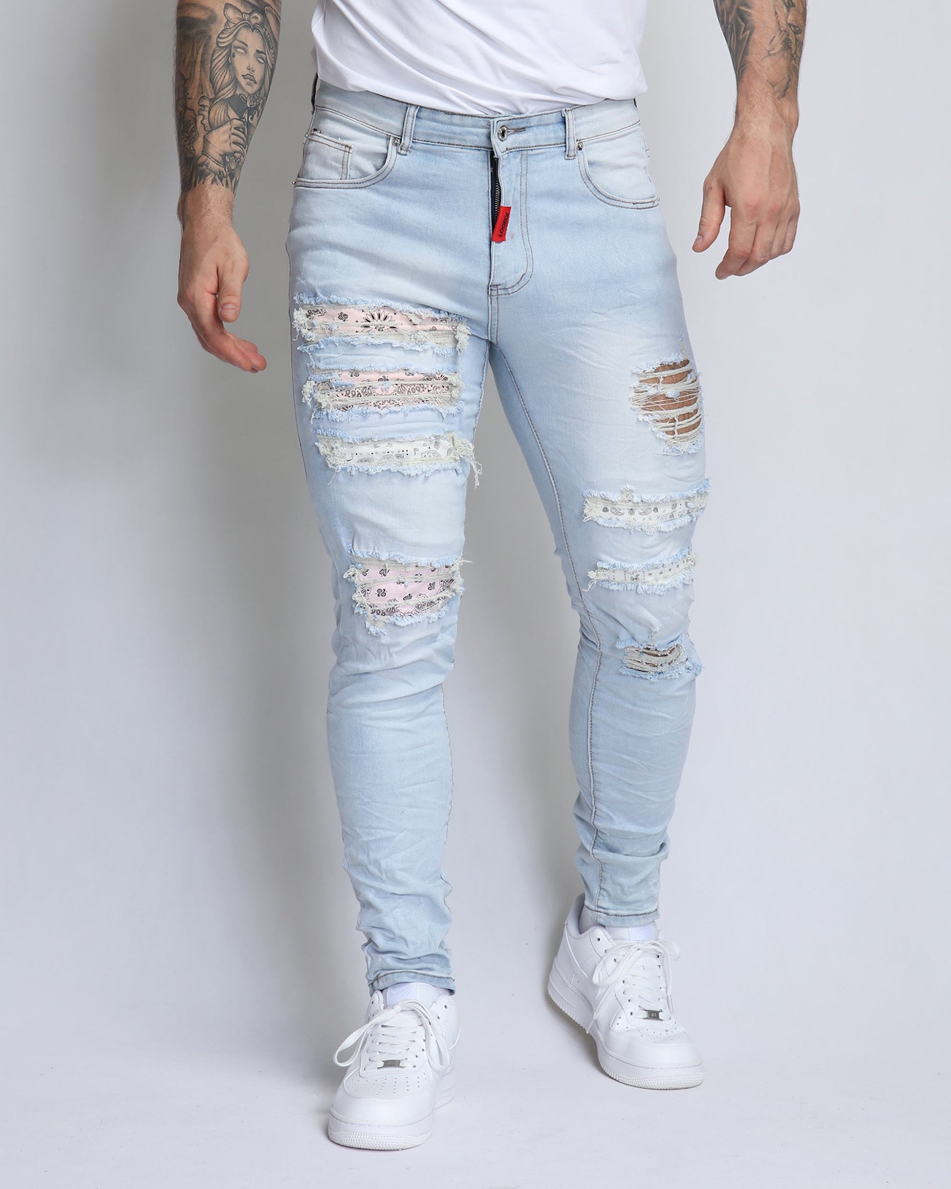 Logeqi pink cashew blossom jeans with distressed detailing and a skinny fit for a trendy look