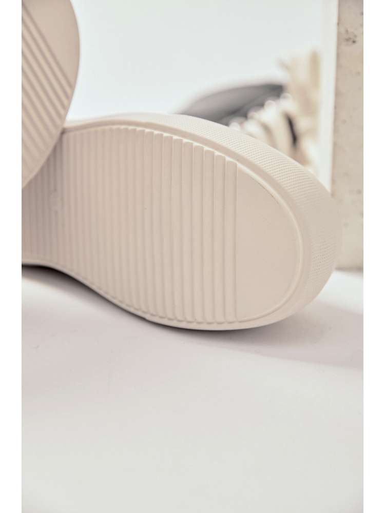 Close-up view of the sole of wholesale7 platform high top boots showing tread pattern and texture