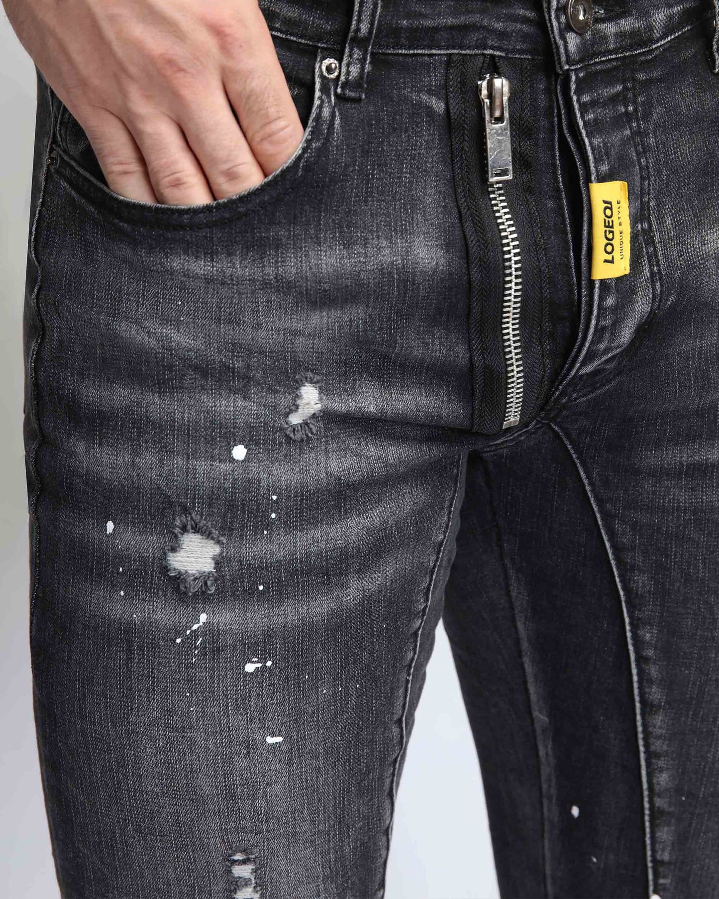 Logeqi ripped black jeans for men featuring a unique zip closure and distressed detailing