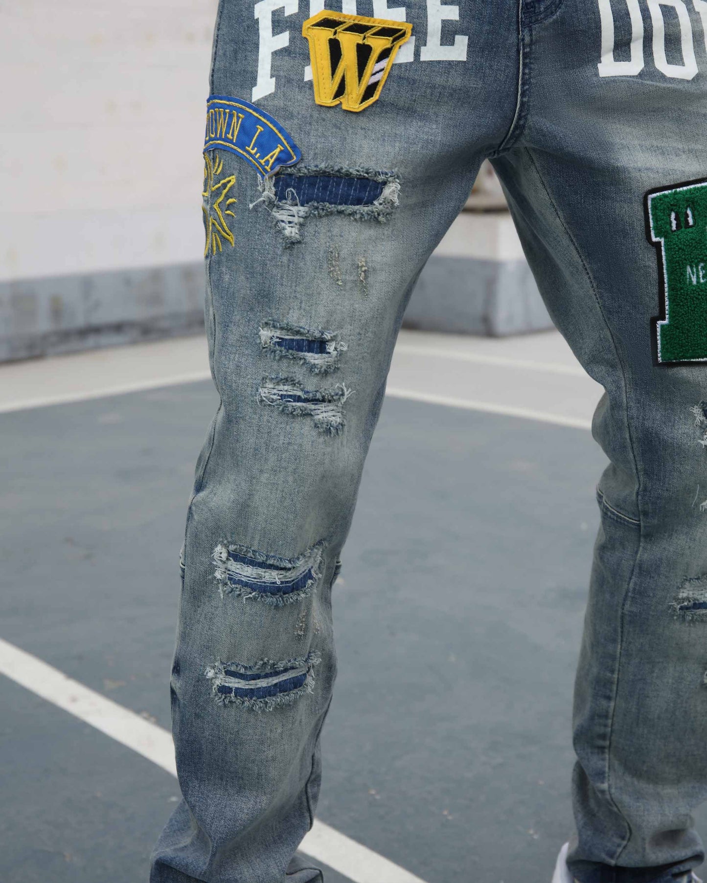 Logeqi ripped patchwork jeans with distressed design and colorful patches for a trendy look