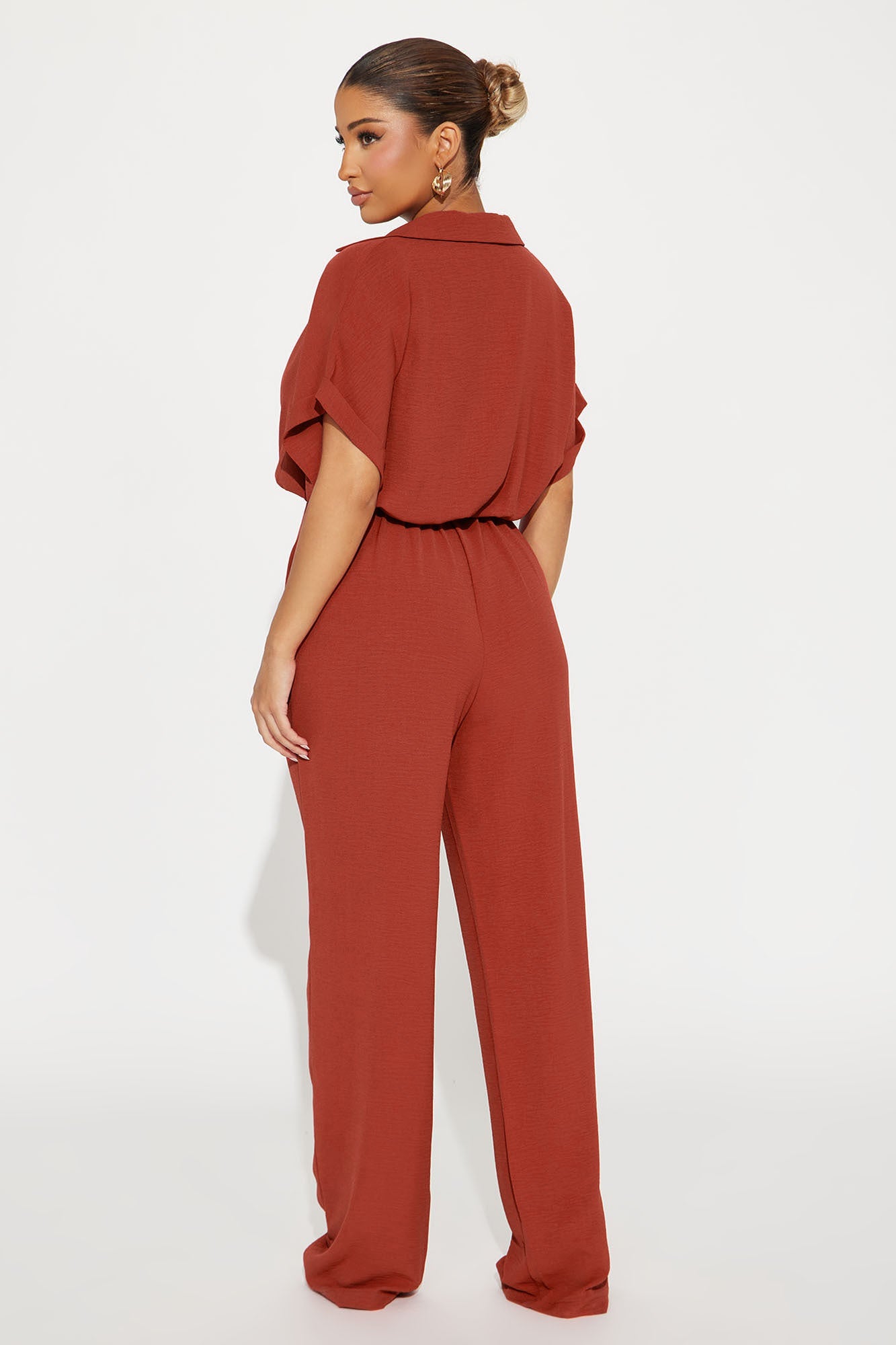 Stylish rust jumpsuit for women with a relaxed fit and collared neckline from Fashion Nova