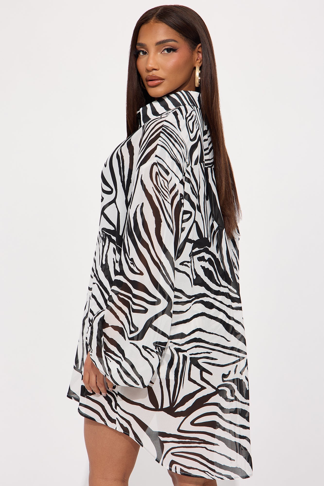 Fashion Nova zebra print short set sheer collared long sleeve top with matching shorts on model