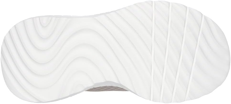 Skechers women's slip-on sneakers showing the textured white outsole for added traction and comfort
