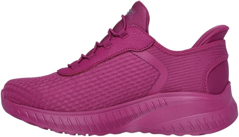 Skechers women's slip-on sneakers in vibrant pink with a breathable mesh design for all-day comfort