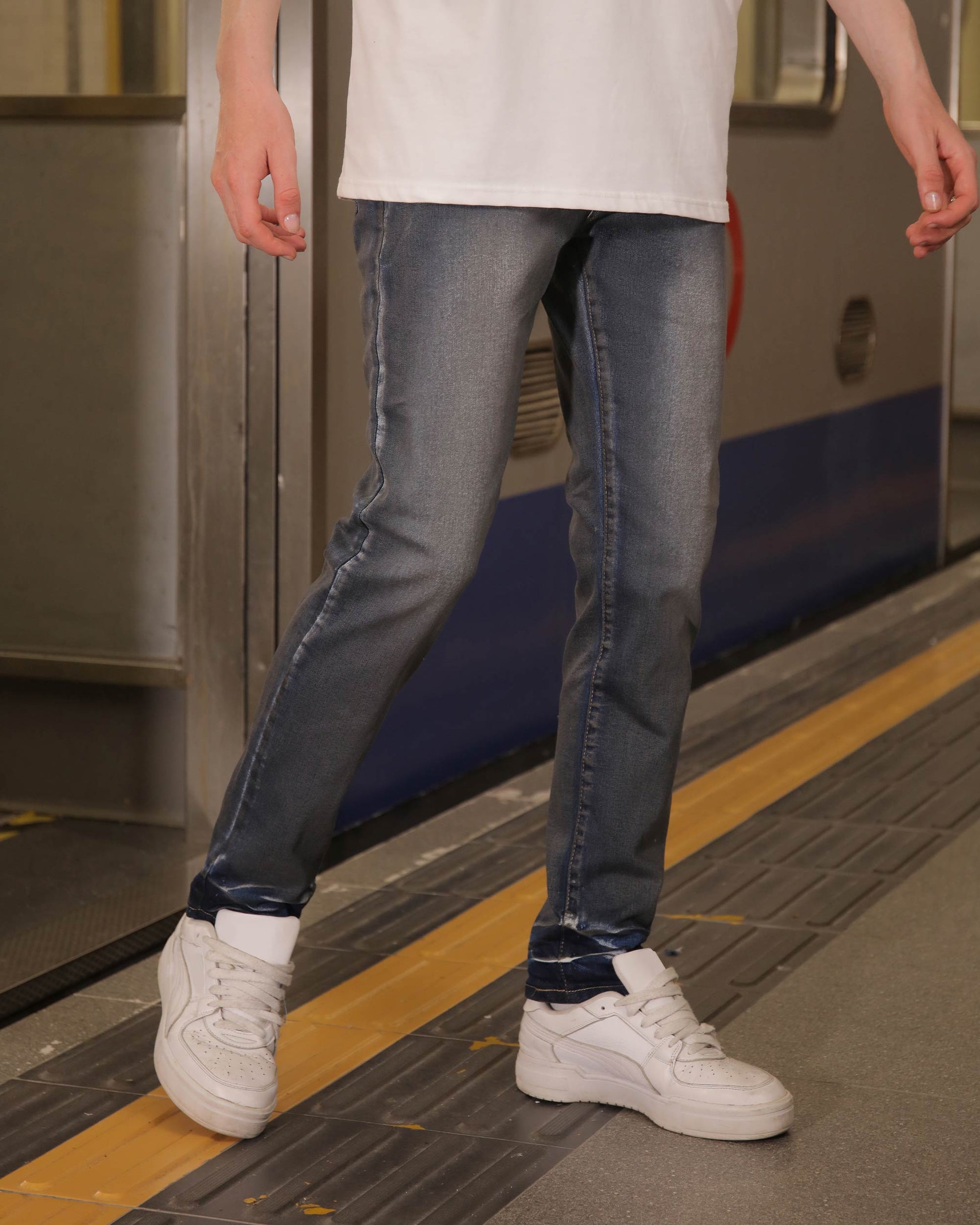 Logeqi slim fit dark wash jeans styled with a white t-shirt and sneakers for casual wear