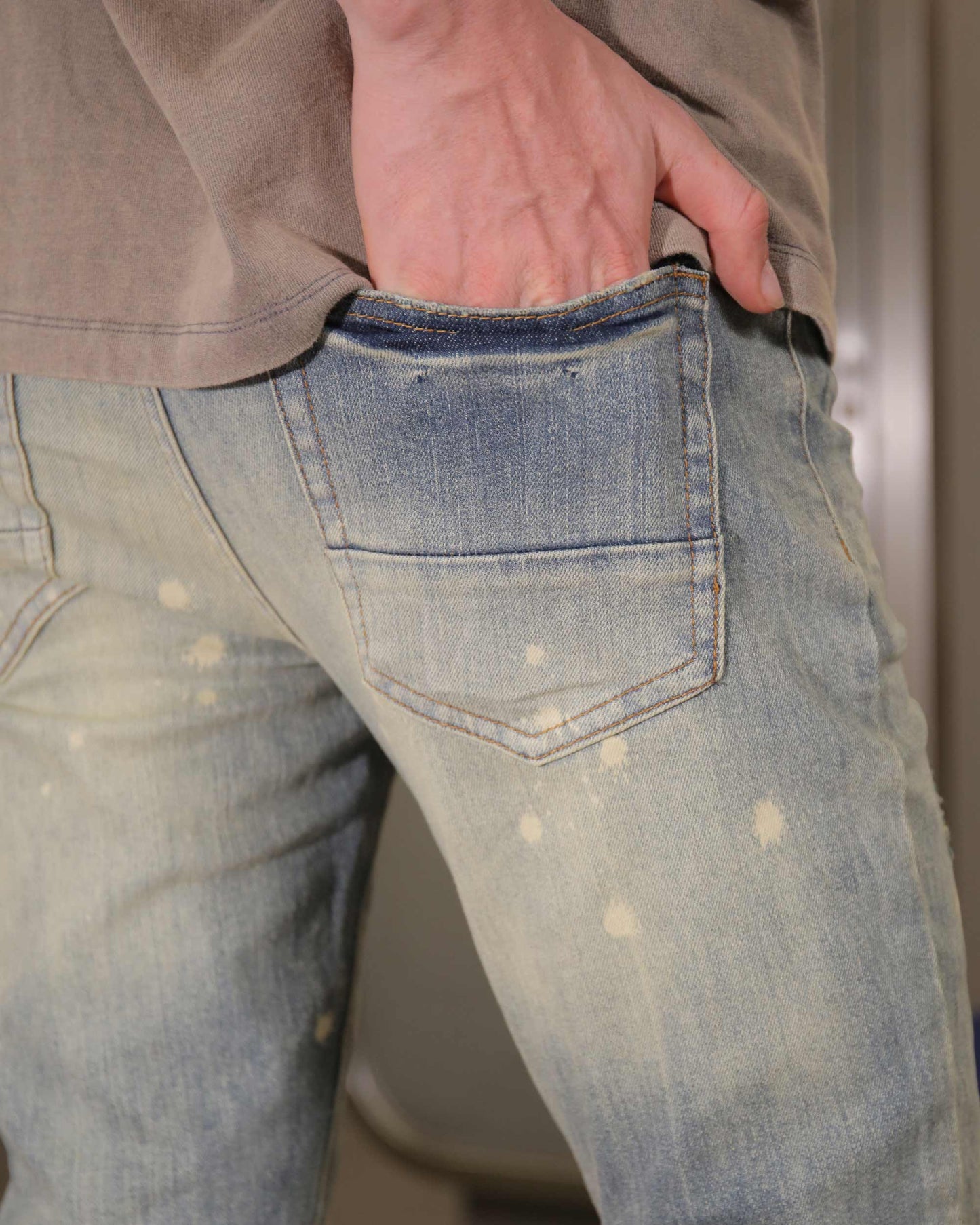 Logeqi slim fit distressed jeans featuring a trendy worn look and comfortable pockets