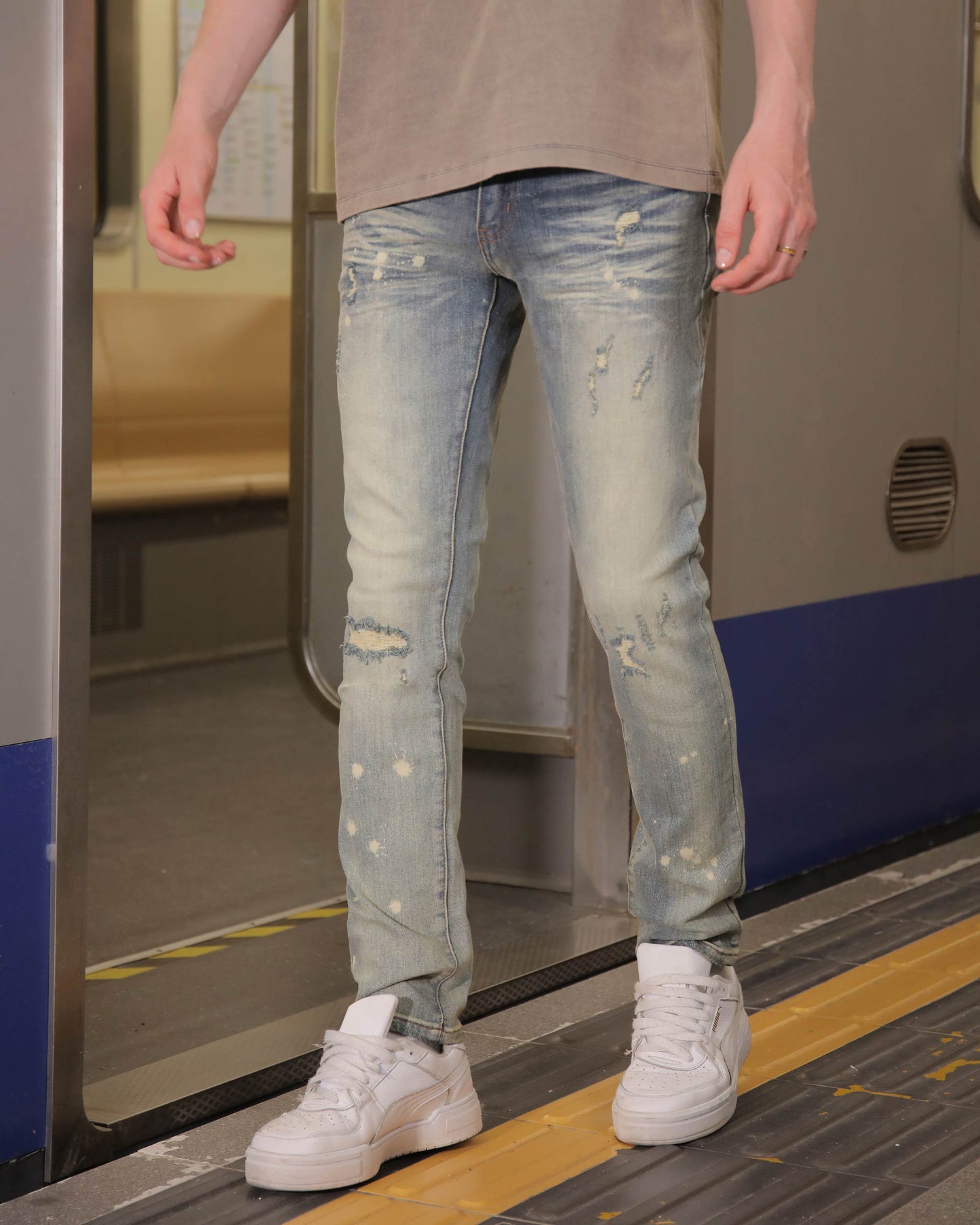 Logeqi slim fit distressed jeans in light wash with stylish rips and modern design