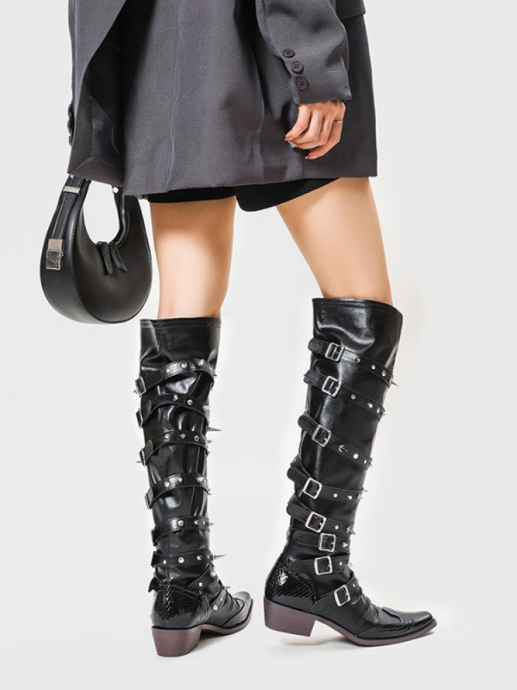 Wholesale7 solid color knee-high boots in black with multiple buckles and studs on model legs
