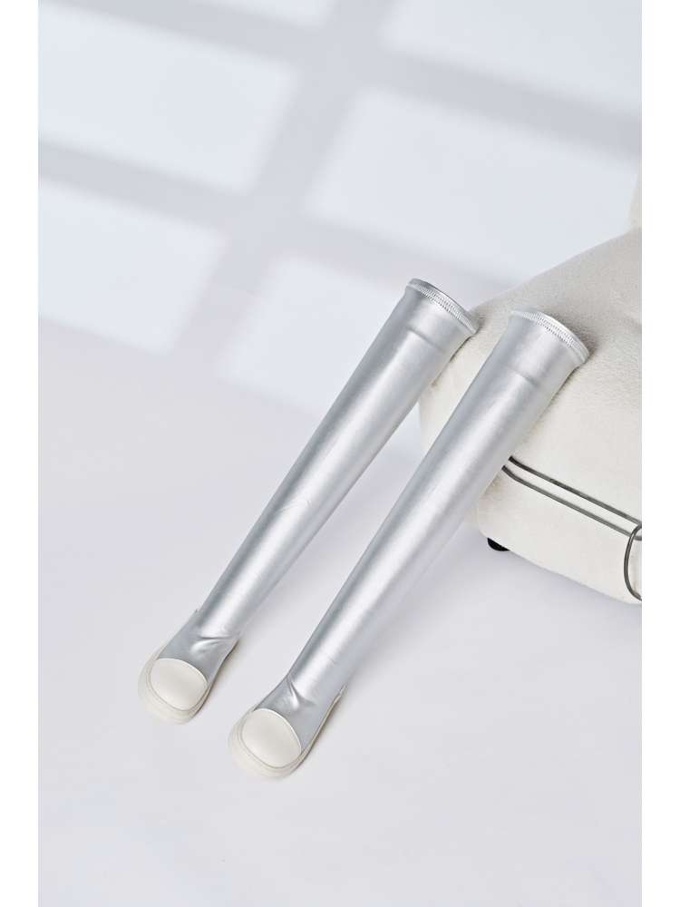 Silver solid PU patchwork boots with a sleek design by wholesale7 displayed on a white surface