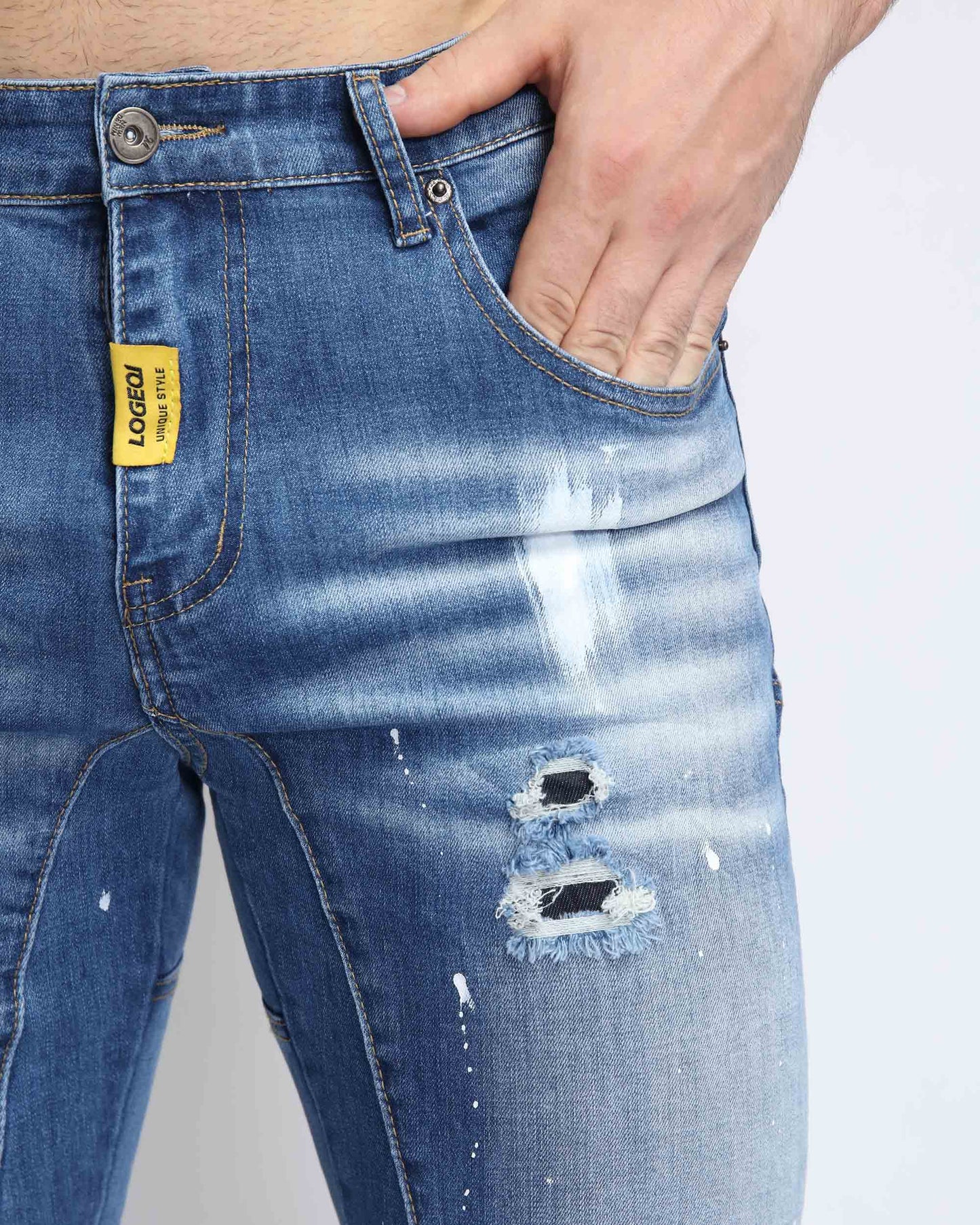 Logeqi spray paint ripped jeans featuring distressed details and a modern fit