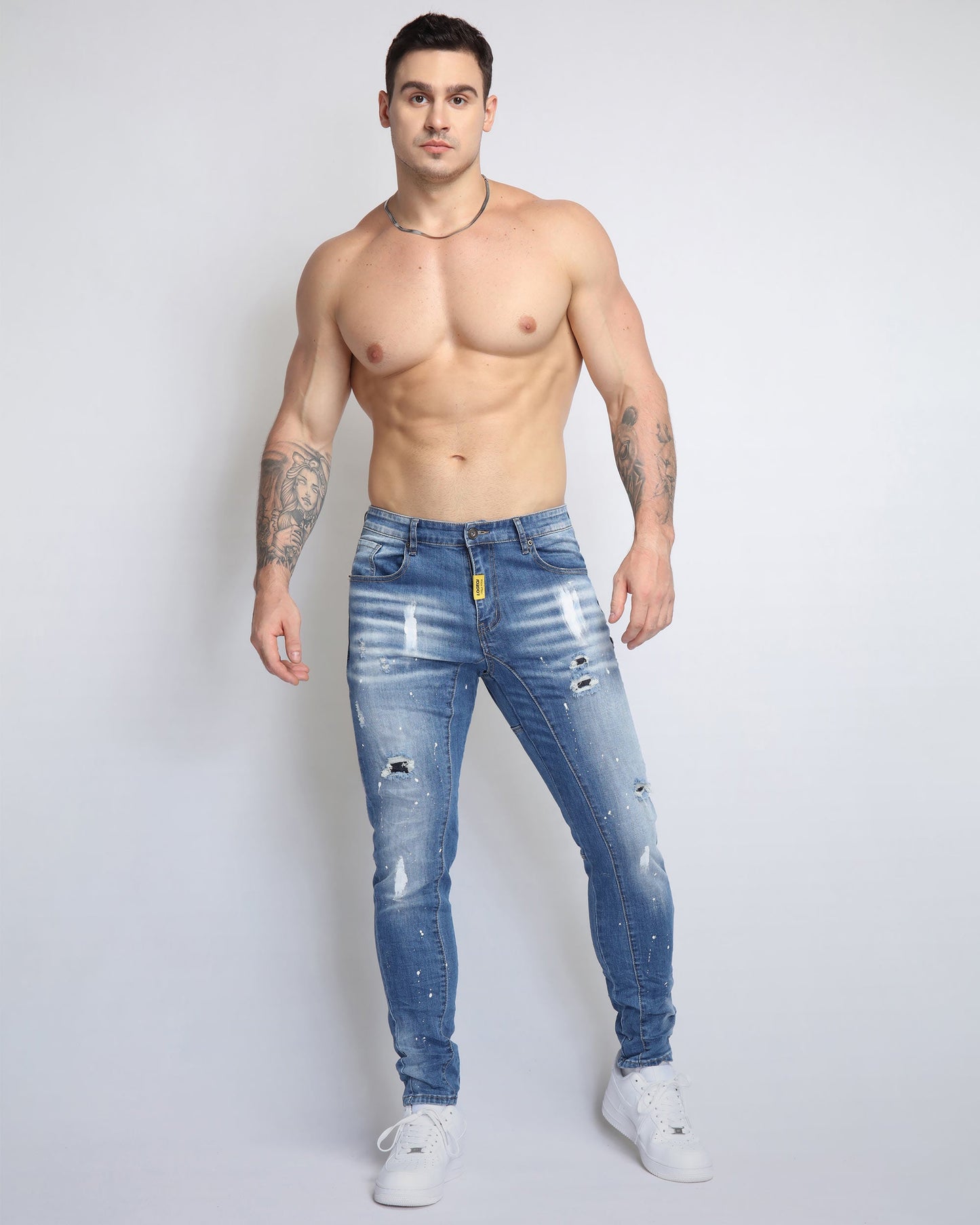 Logeqi spray paint ripped jeans in light blue with distressed details for a stylish casual look