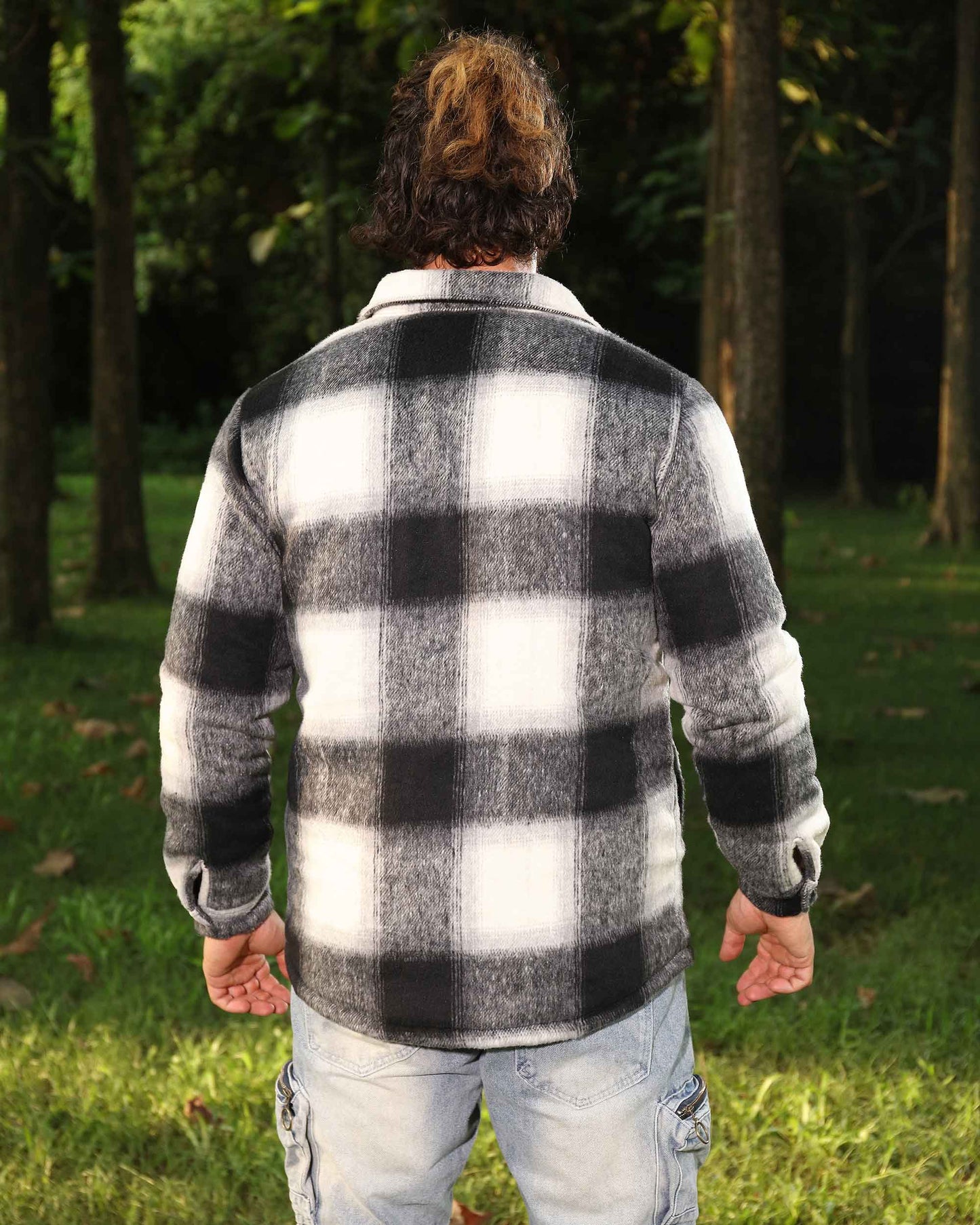 Logeqi spring plaid jacket in black and white worn outdoors with a checkered pattern design