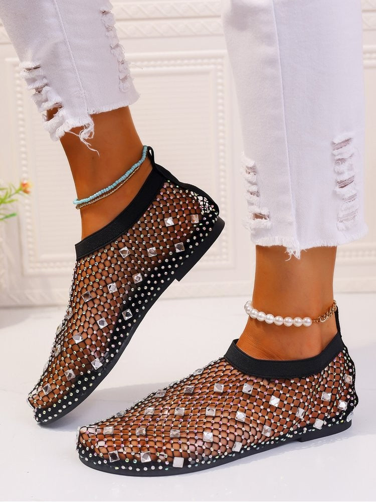 Wholesale7 stylish solid color sandals in black mesh design with rhinestone accents and ankle accessories