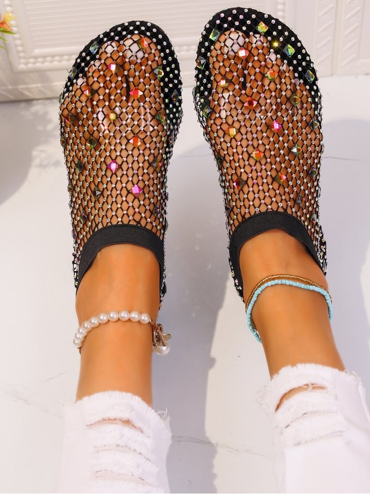 Stylish solid color sandals with black mesh and colorful rhinestones by wholesale7 on feet