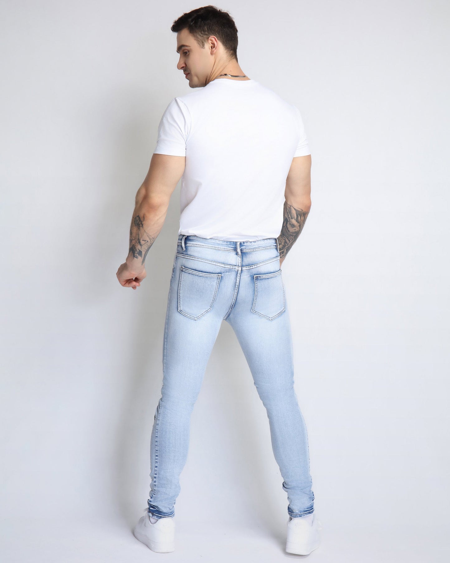 Logeqi trendy distressed jeans for men in light wash with a slim fit design
