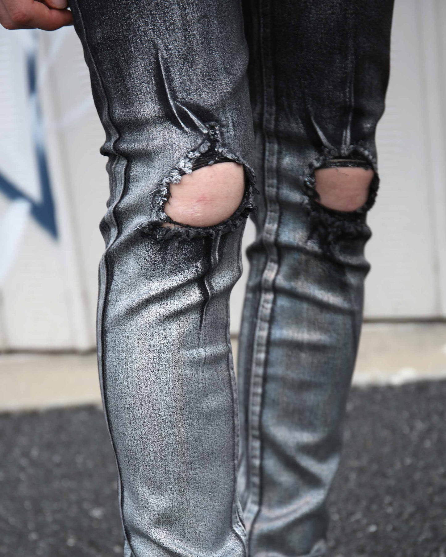 Logeqi gradient ripped black jeans with distressed knee holes and faded ombre effect