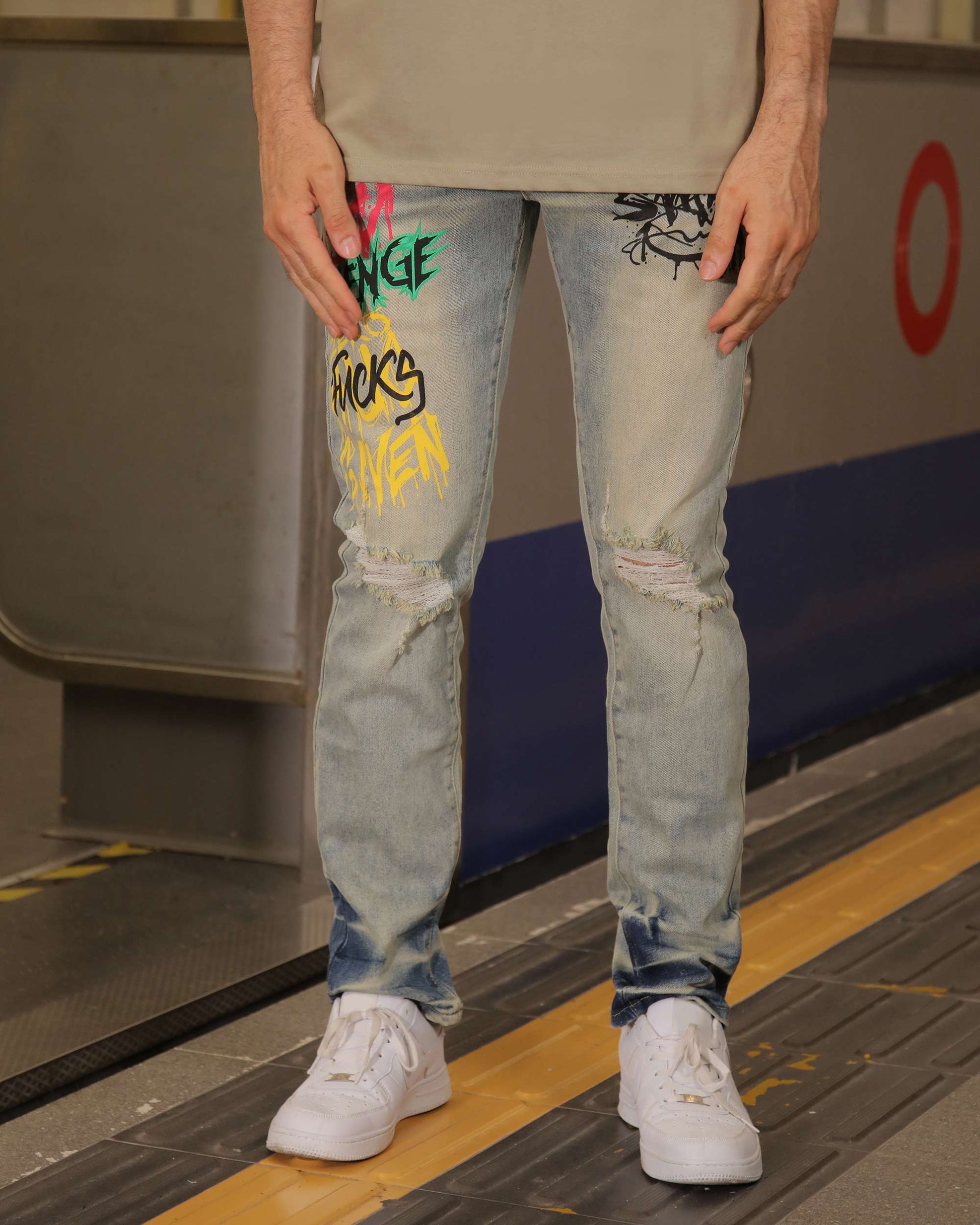 Logeqi graffiti streetwear jeans with colorful graphic prints and distressed knee details