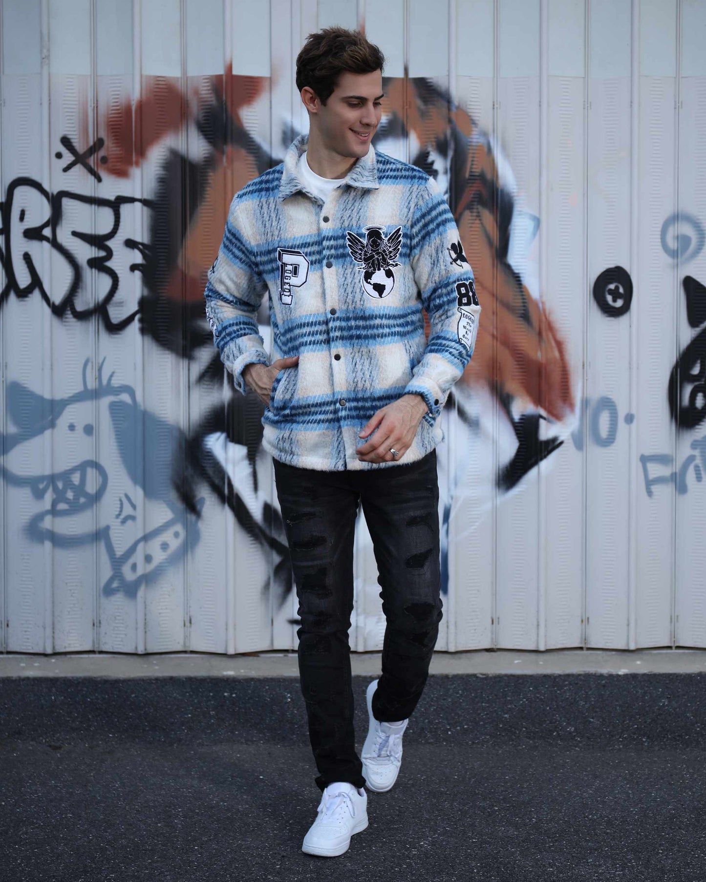 Logeqi insulated plaid moto jacket in blue and white worn by a man with black jeans and white sneakers