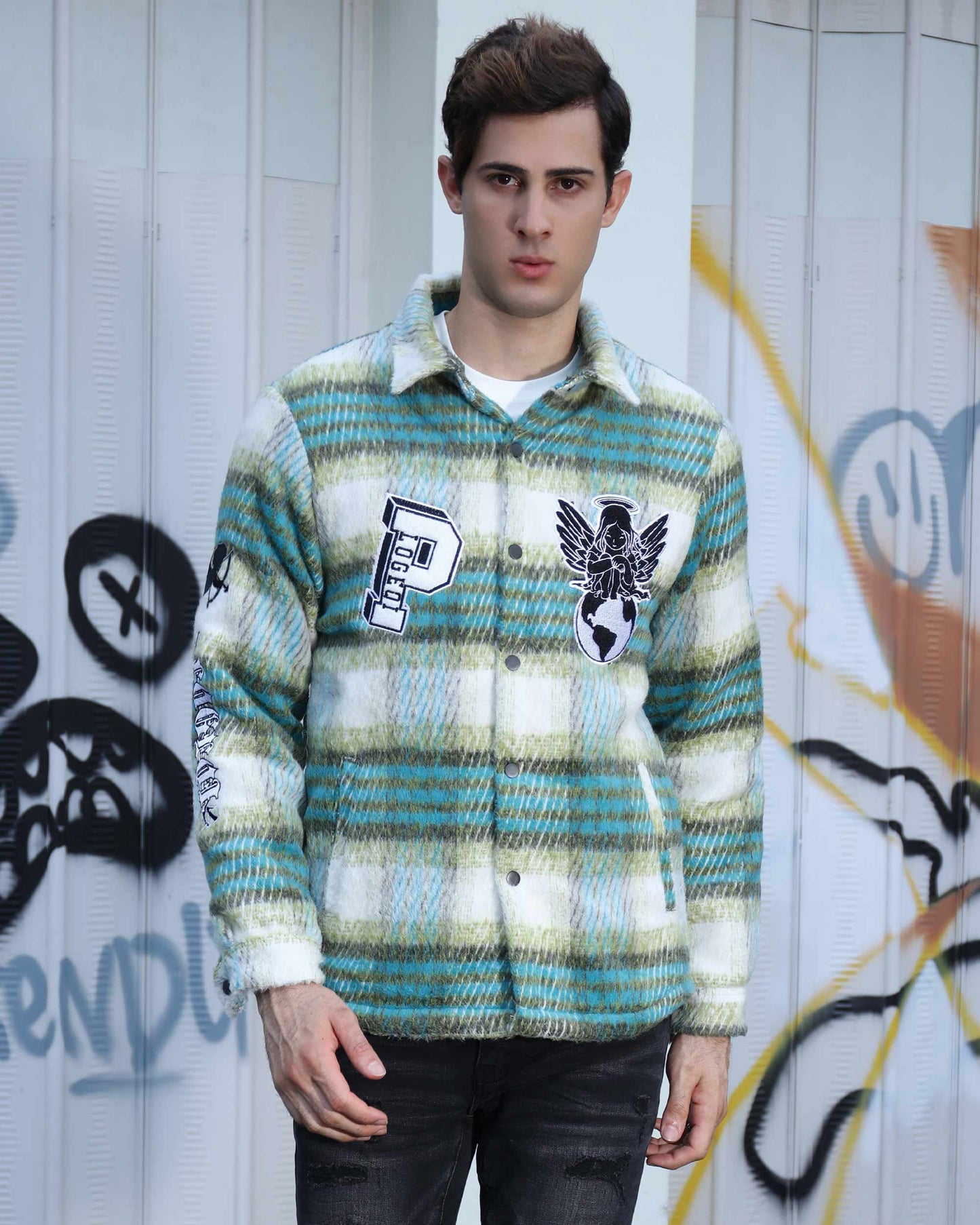 Logeqi insulated plaid moto jacket in green and white with graphic patches worn by male model