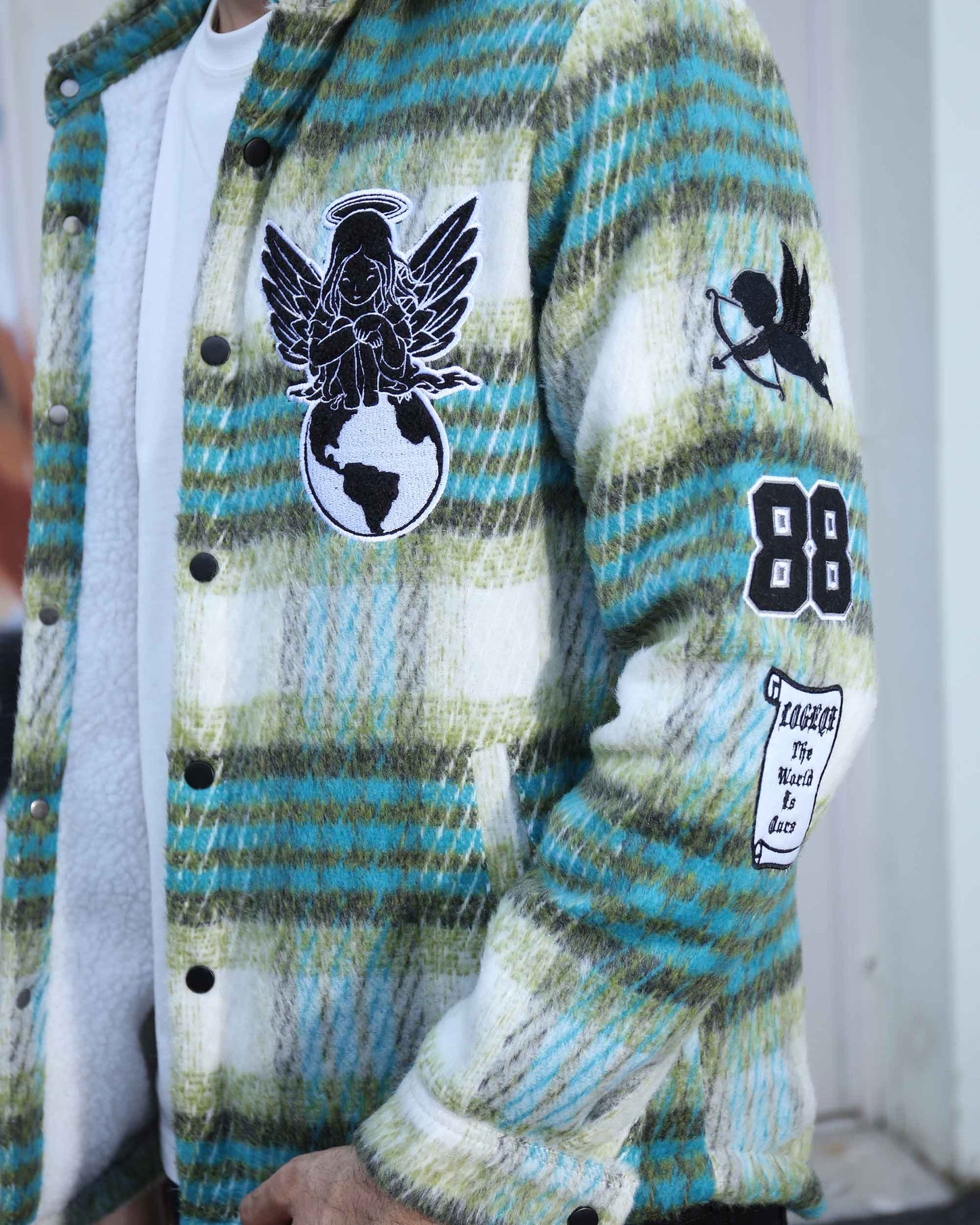 Logeqi insulated plaid moto jacket with green and blue check pattern and black patches on sleeve and chest