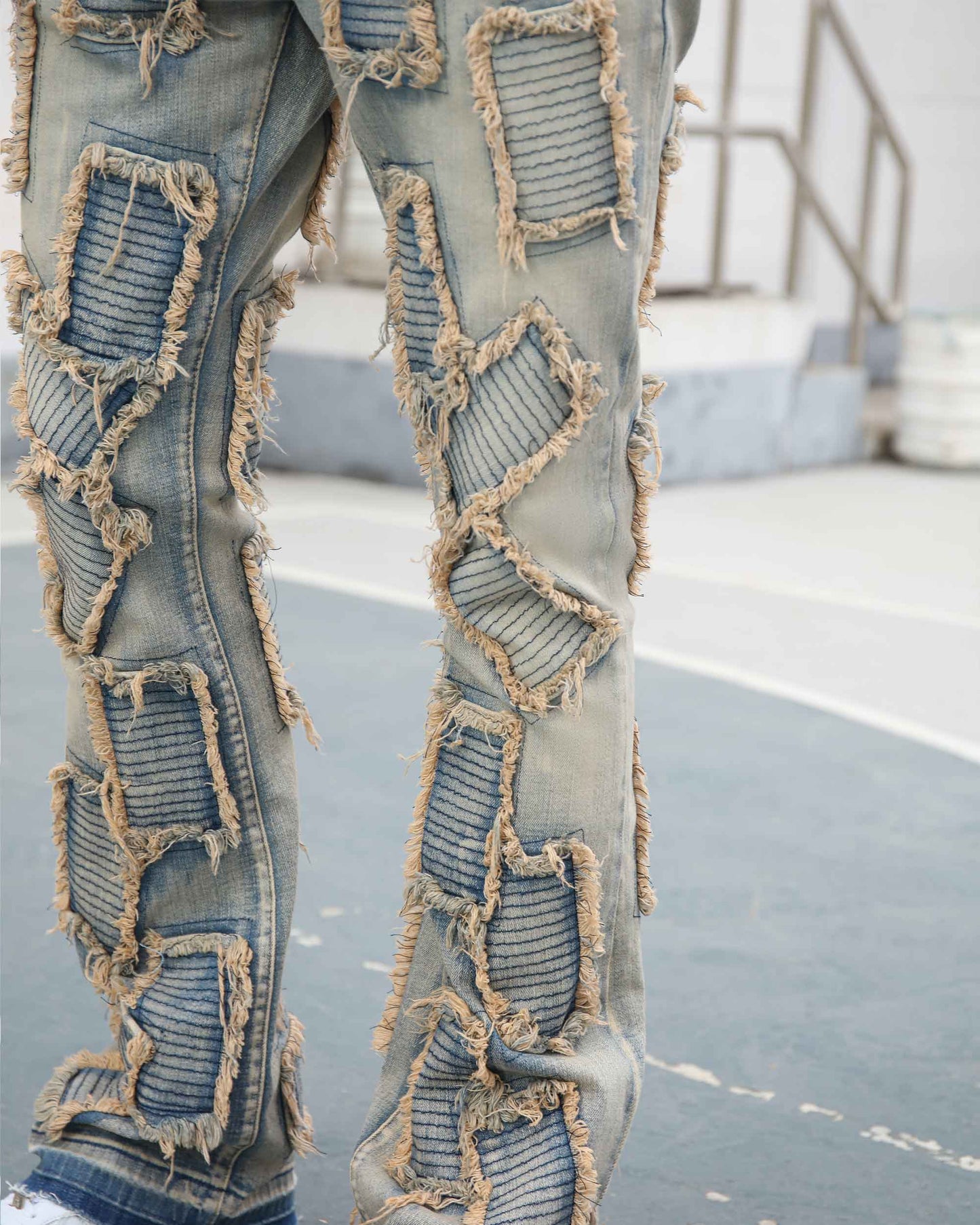 Logeqi vintage blue flared jeans with distressed patches and frayed edges for a trendy look