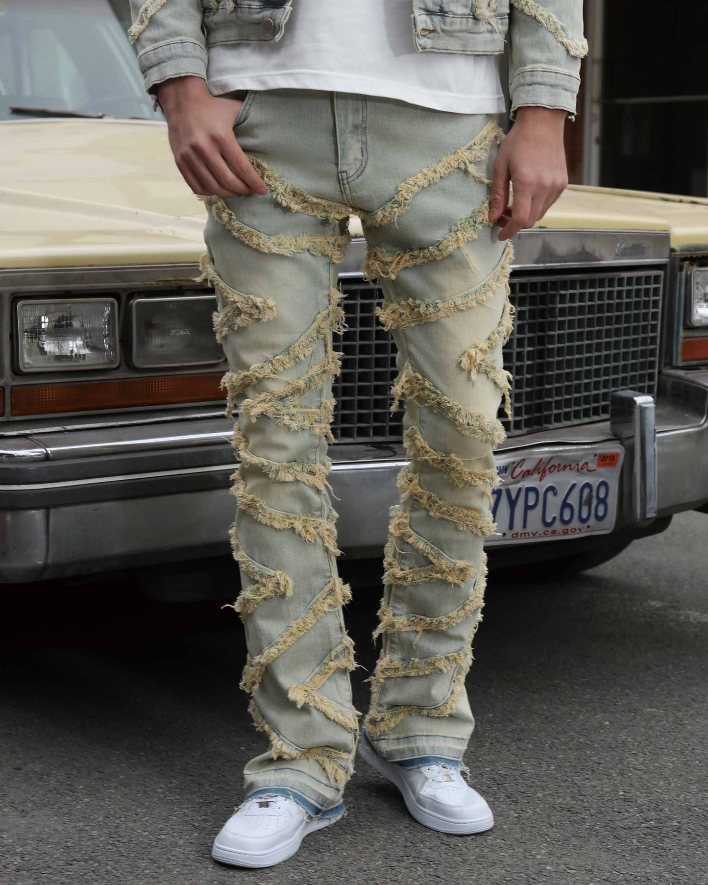 Logeqi vintage distressed blue jeans with unique ripped details and a relaxed fit