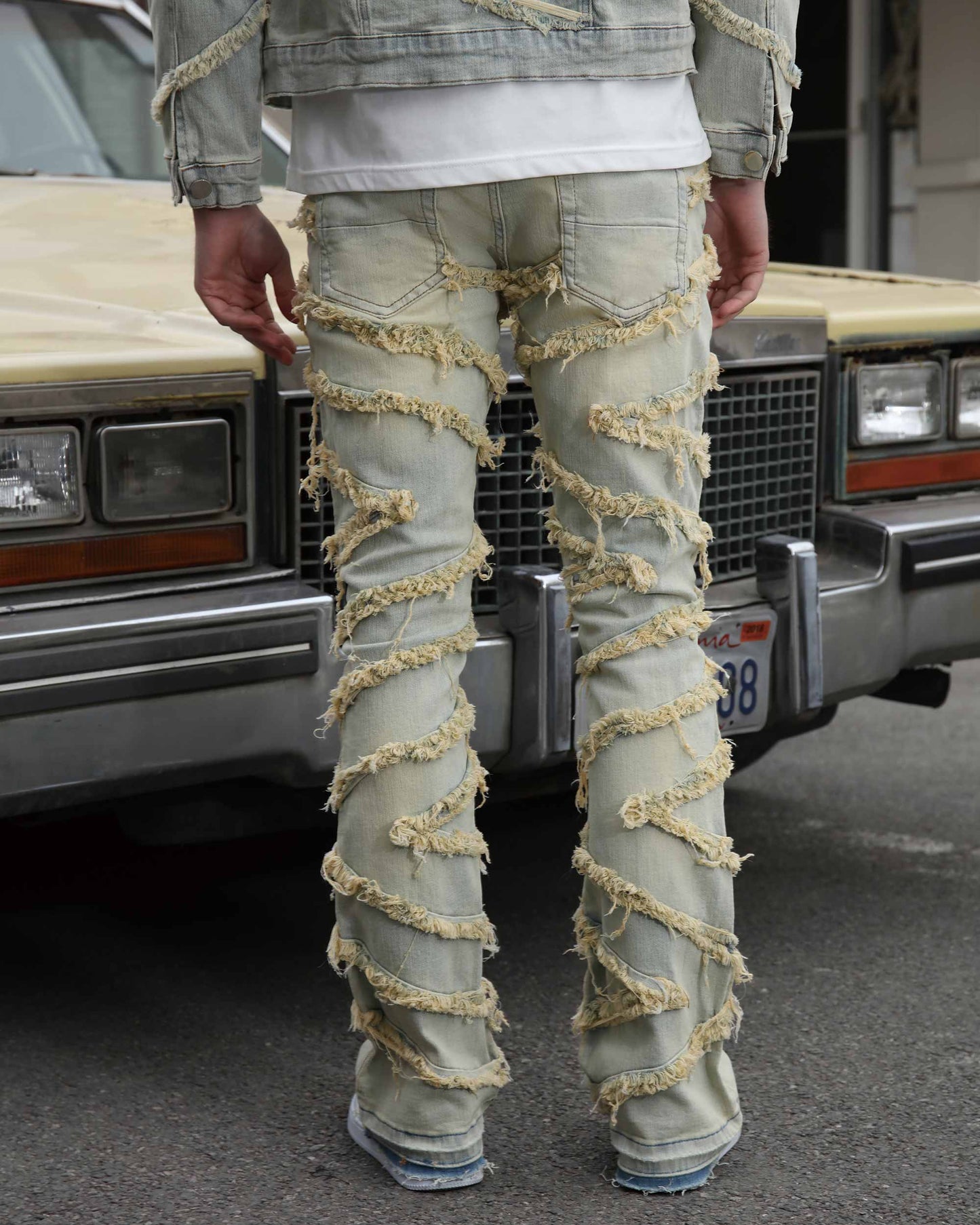 Logeqi vintage distressed blue jeans with unique frayed design and relaxed fit for casual style