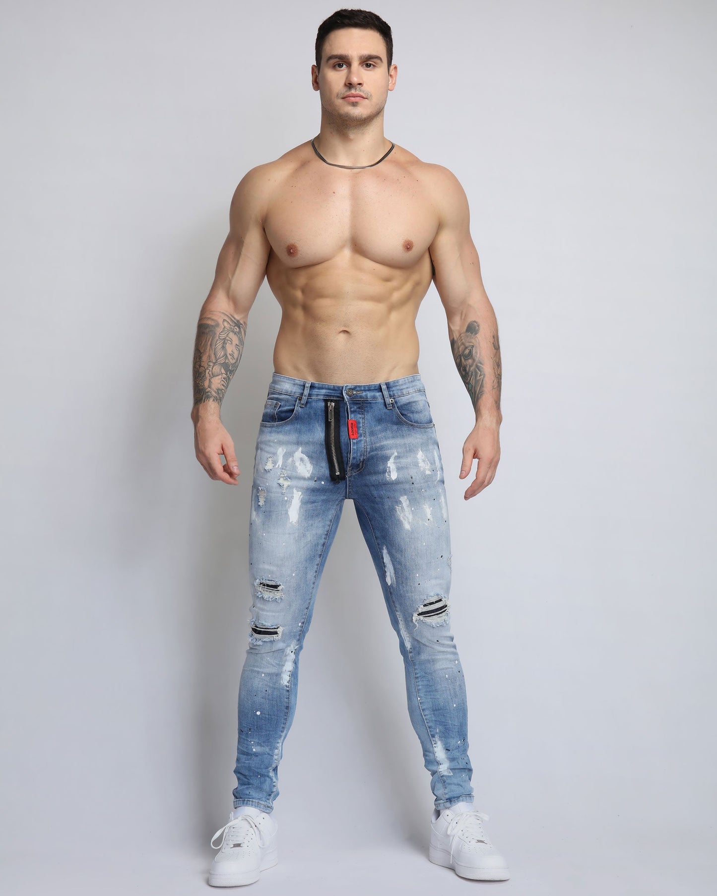 Logeqi vintage ripped denim jeans featuring a slim fit and distressed detailing for a trendy look