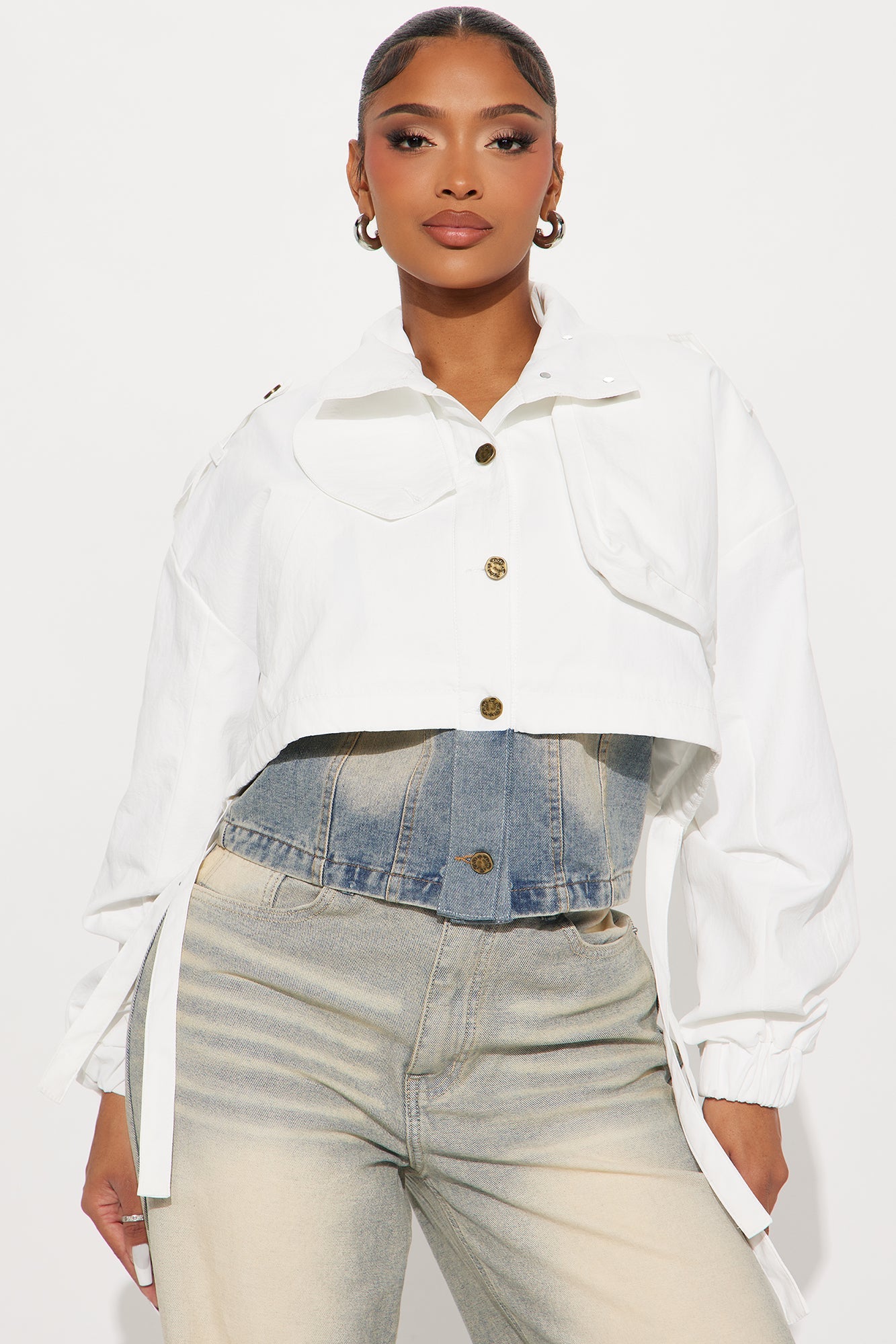 Fashion Nova white cropped trench coat featuring a stylish design and button details