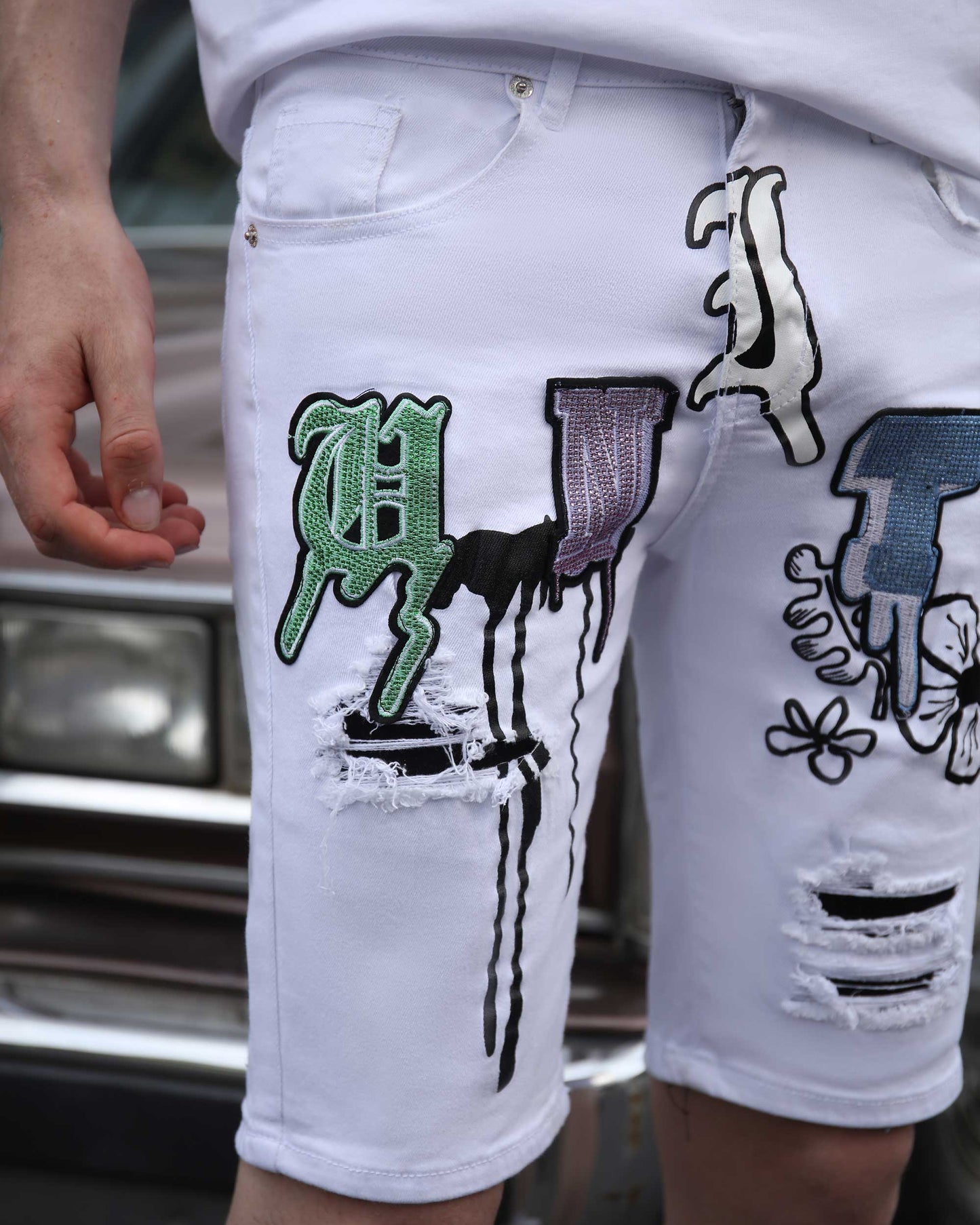 Logeqi White Ripped Denim Shorts with Colorful Graphic Patches and Distressed Details