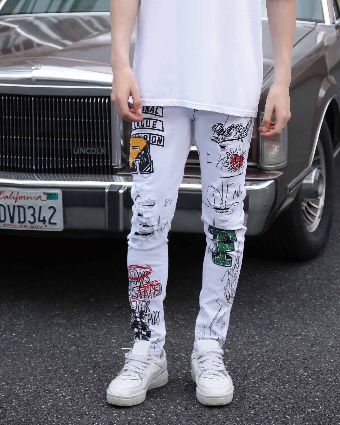 Logeqi white ripped jeans graffiti featuring unique designs and a trendy street style look