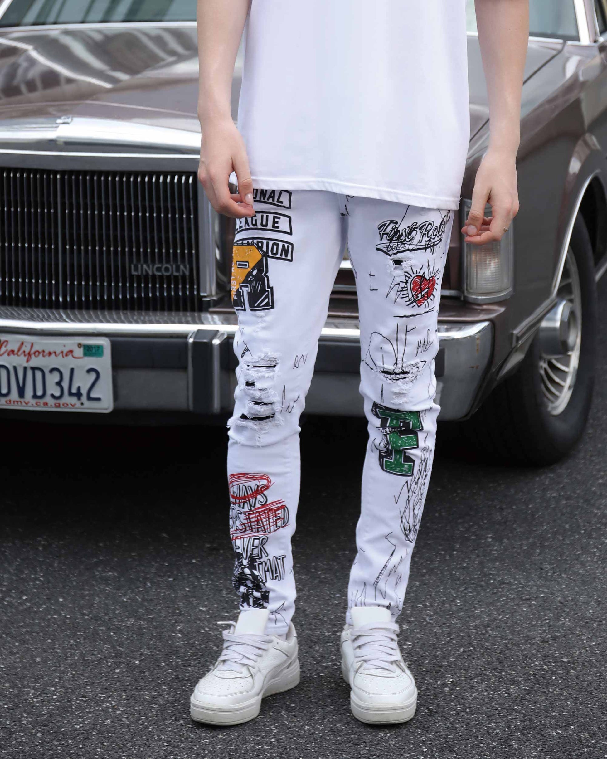 Logeqi white ripped jeans graffiti featuring unique designs and a trendy street style look