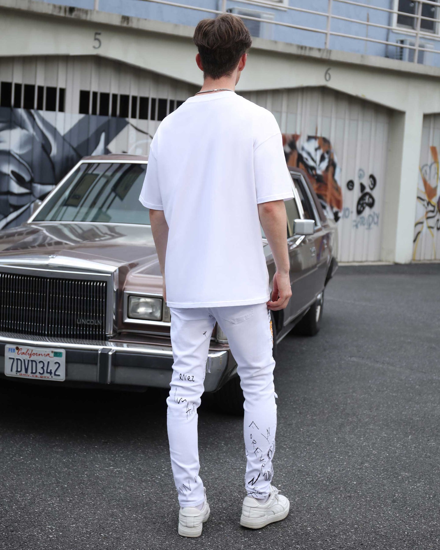 Logeqi white ripped jeans graffiti featuring unique designs for a trendy street style
