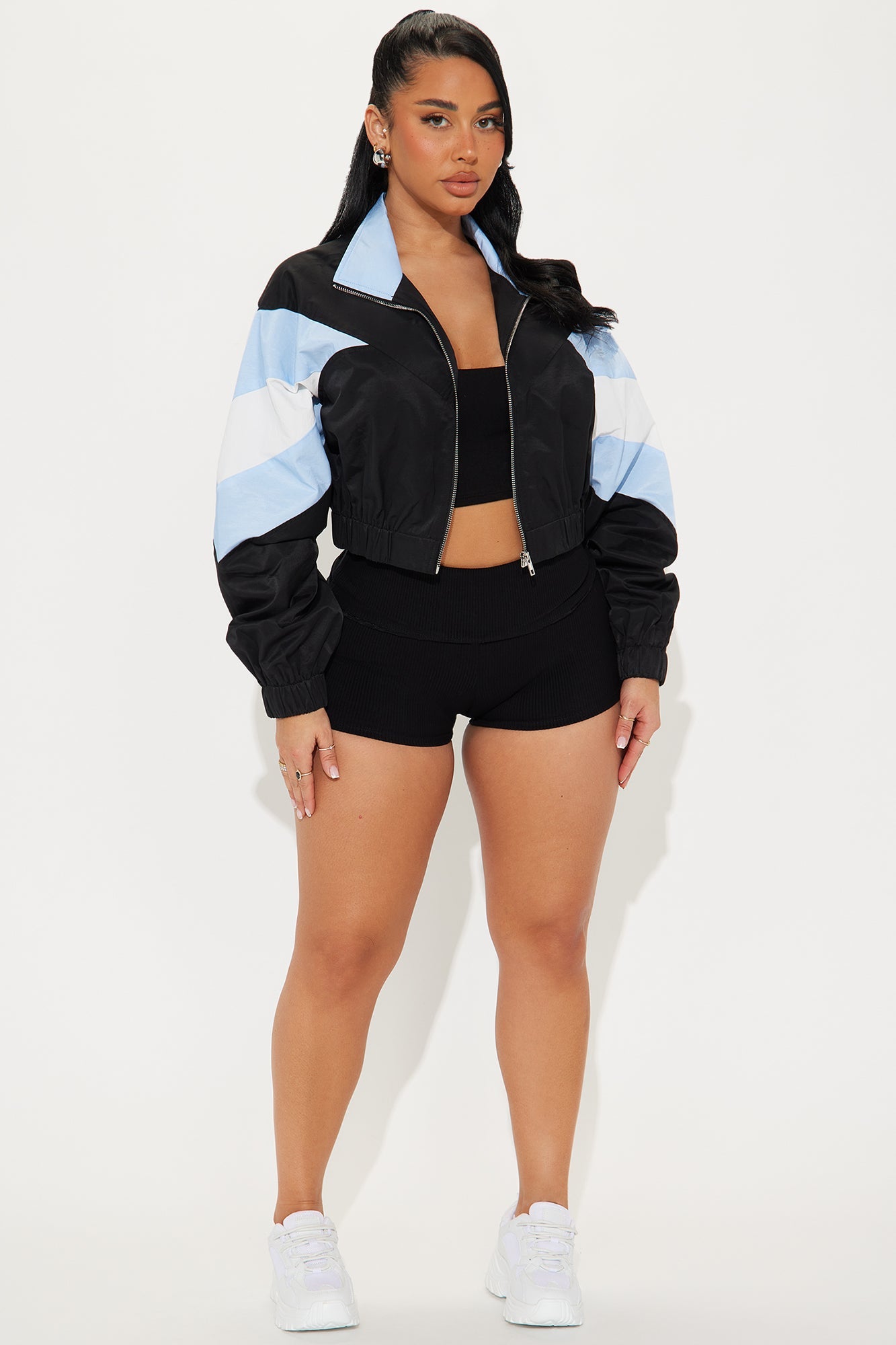 Fashion Nova women's active jacket in black and blue with stylish cropped design for fitness enthusiasts