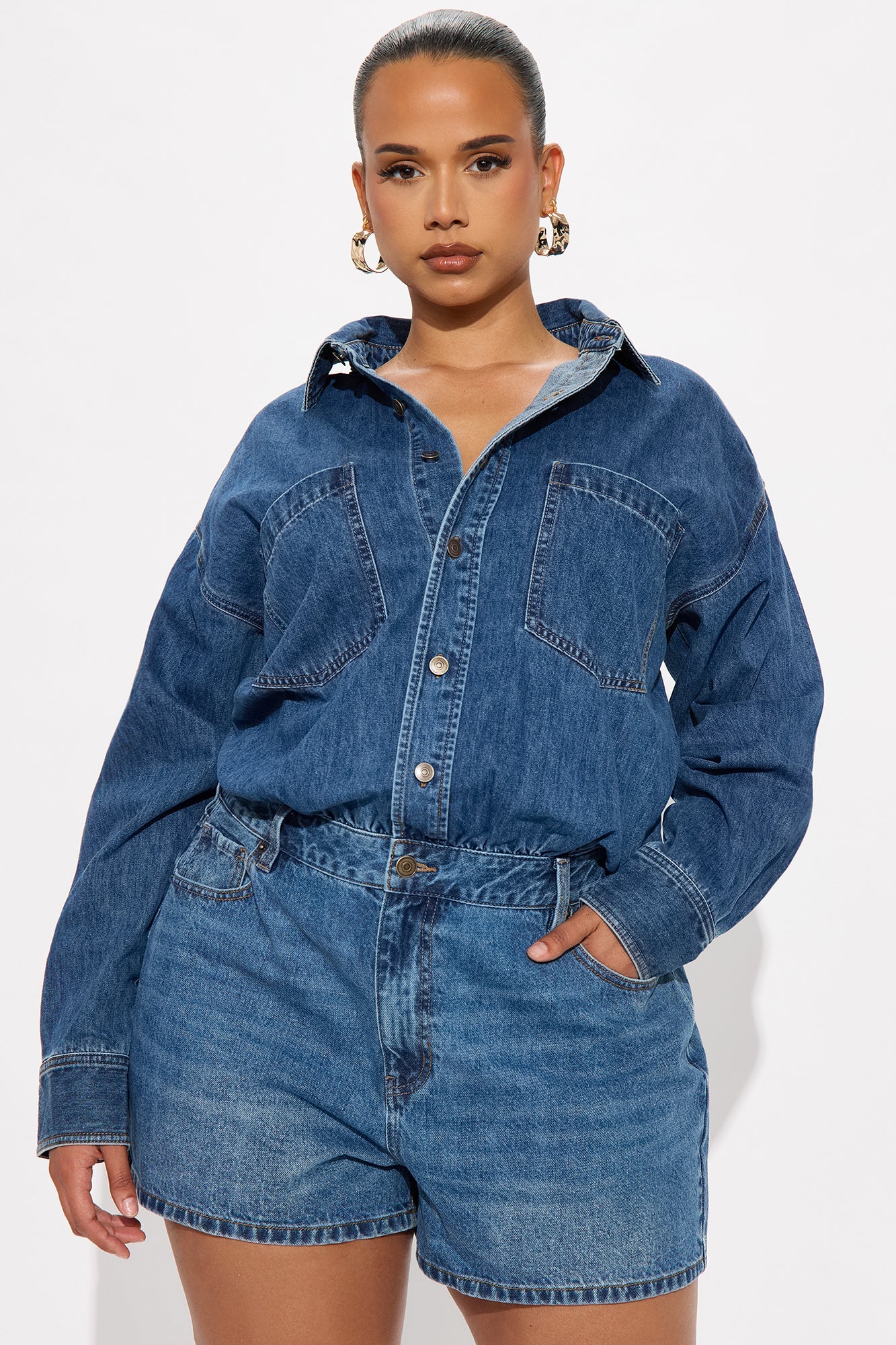Fashion Nova women's denim romper featuring a button-up design and relaxed fit for comfort and style