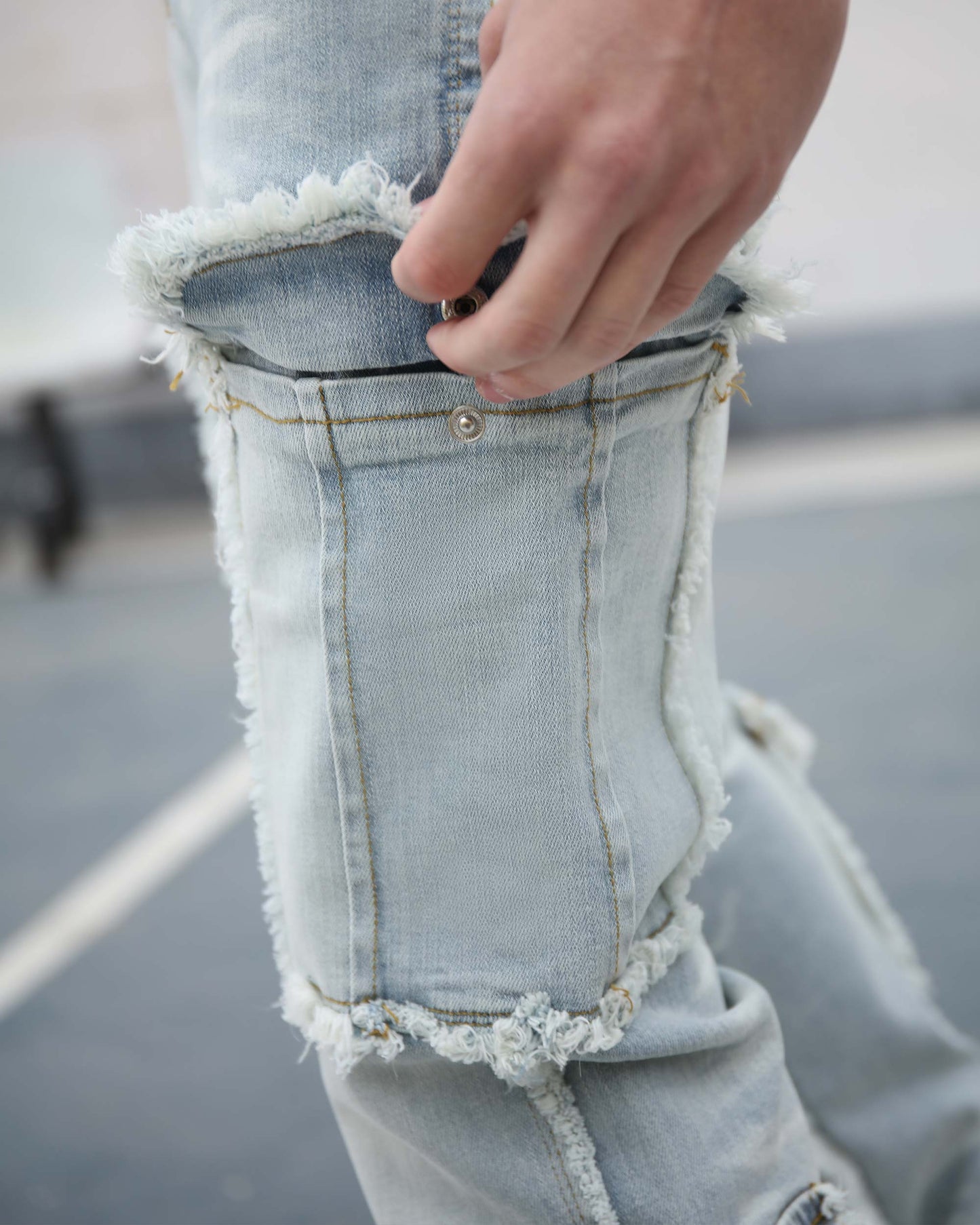 Logeqi workwear flared jeans with distressed detailing and practical side pockets for casual style