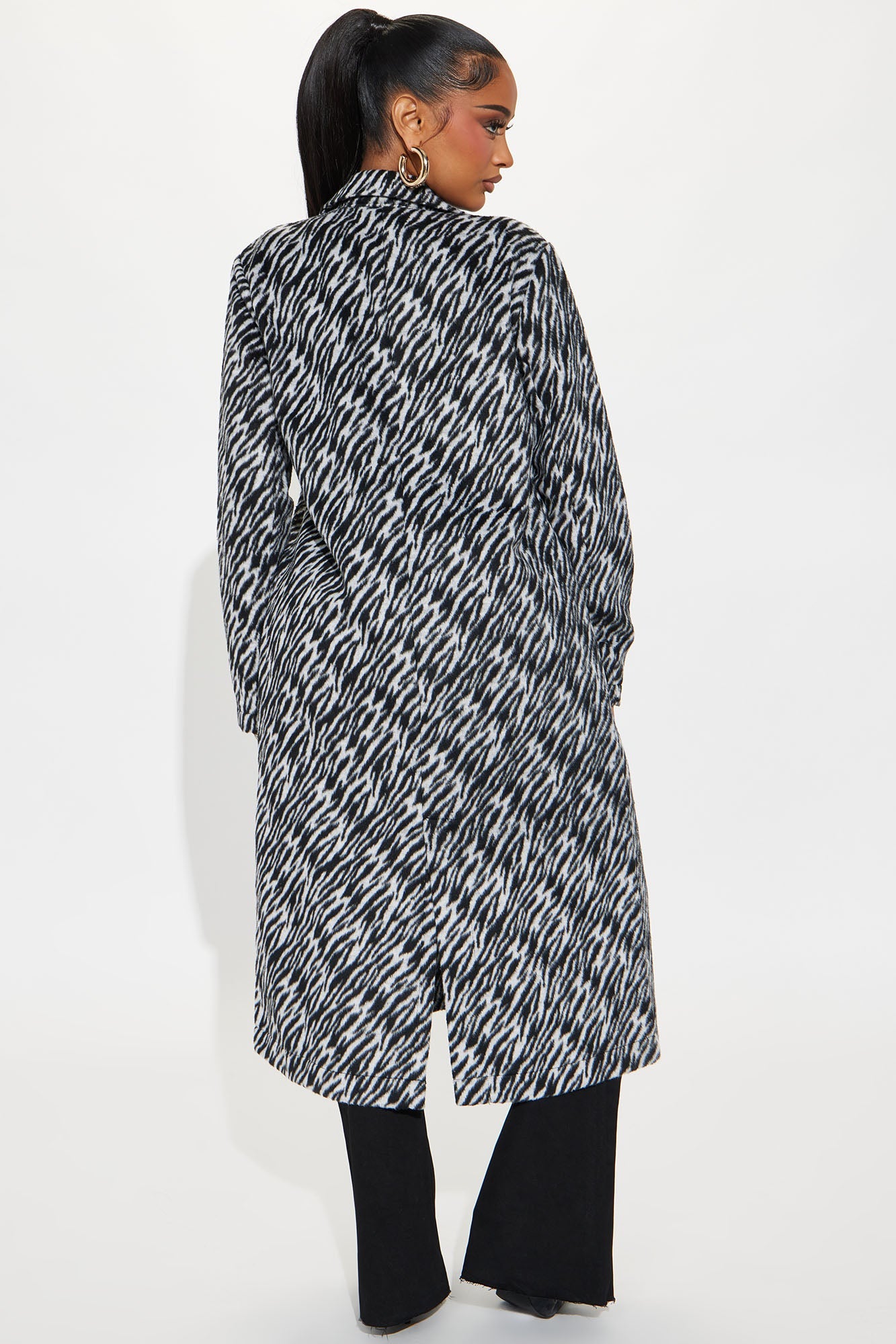 Fashion Nova zebra print wool trench coat with a stylish long design for modern looks