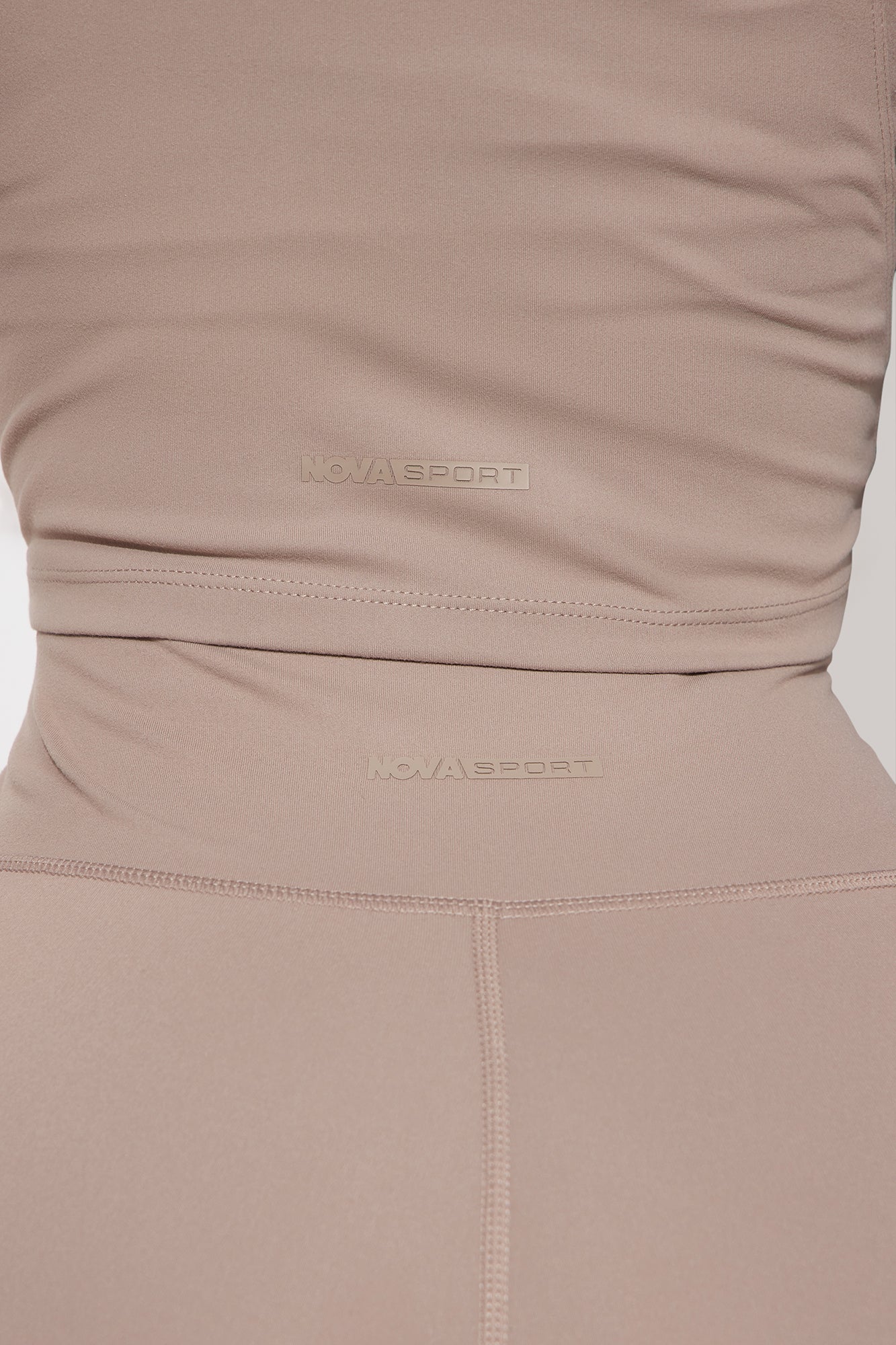 https://cdn.shopify.com/s/files/1/0293/9277/files/04-22-24_S2_31_ZDFN1507TOP_Taupe_P_KJ_RL_15-14-50_16958_PXF.jpg?v=1713999369