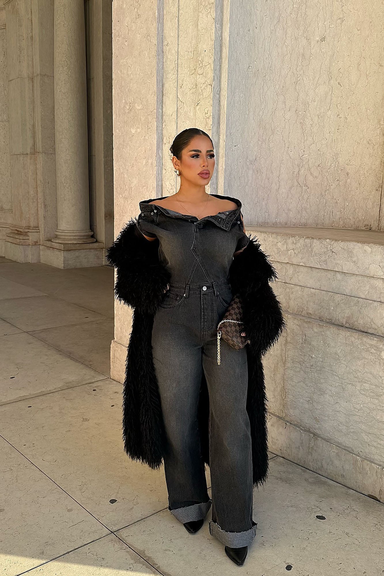 https://cdn.shopify.com/s/files/1/0293/9277/files/12-23-2024__311_Dakota_Denim_Jumpsuit_Black_LA.jpg?v=1737647621