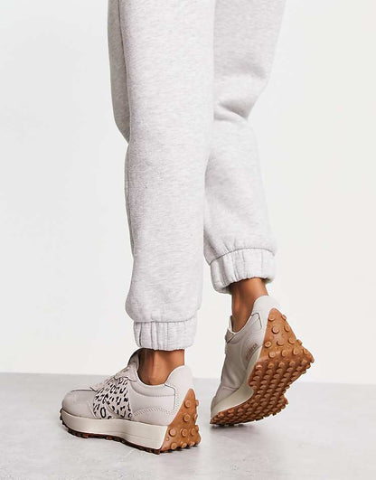 https://images.asos-media.com/products/new-balance-327-trainers-in-off-white-with-leopard-print-detail/203644203-2?$n_750w$&wid=750&fit=constrain