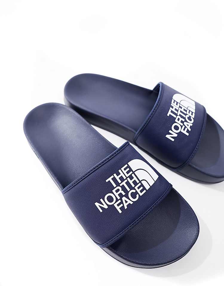 https://images.asos-media.com/products/the-north-face-base-camp-iii-slides-in-navy-and-white/205315099-2?$n_750w$&wid=750&fit=constrain