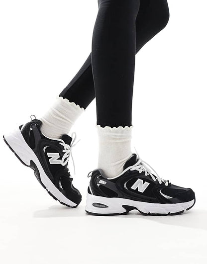 https://images.asos-media.com/products/new-balance-530-trainers-in-black/206021458-1-black?$n_750w$&wid=750&fit=constrain