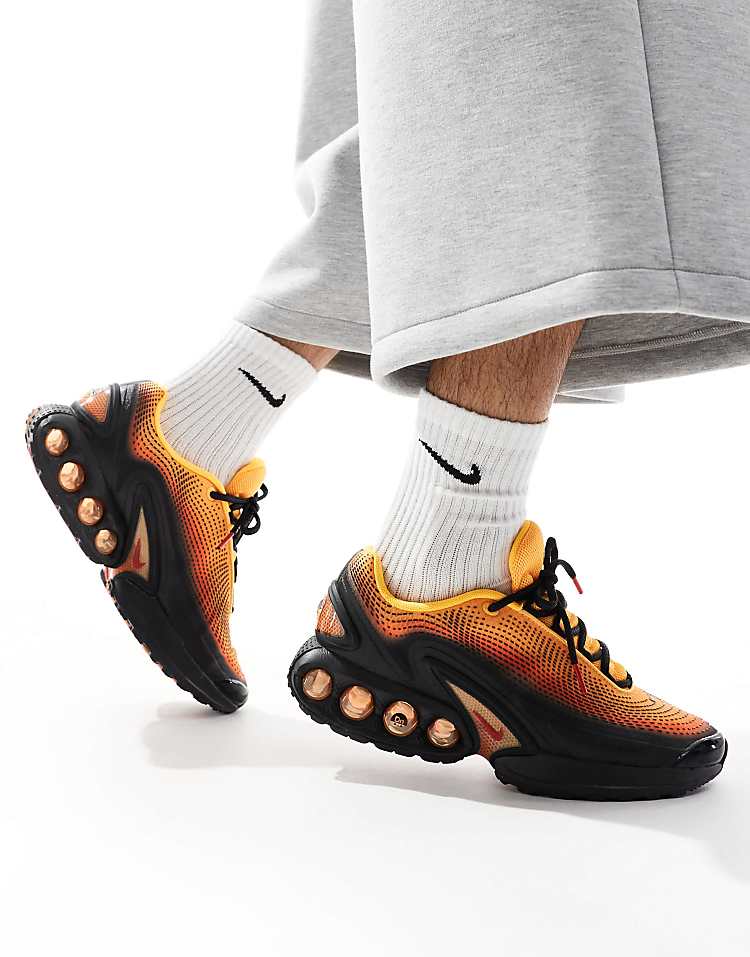 https://images.asos-media.com/products/nike-air-max-dn-trainers-in-black-and-orange/206702589-1-black?$n_750w$&wid=750&fit=constrain