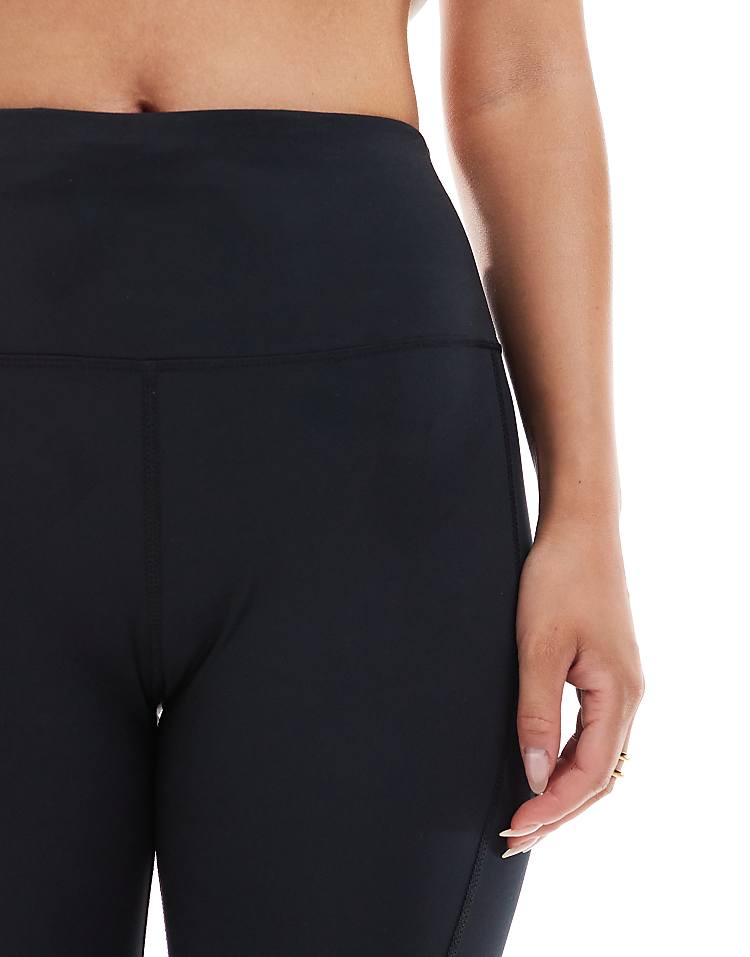 https://images.asos-media.com/products/4505-hourglass-icon-running-tie-waist-gym-legging-with-phone-pocket-in-black/206785261-3?$n_750w$&wid=750&fit=constrain